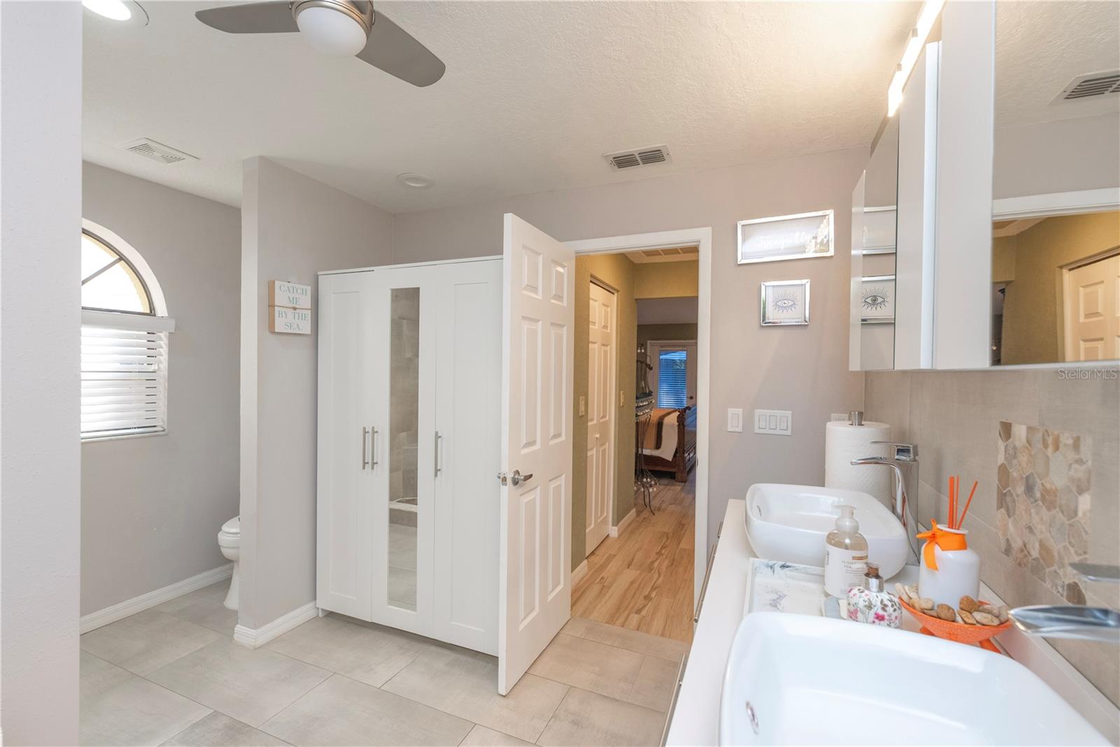 Primary bathroom with double sinks.