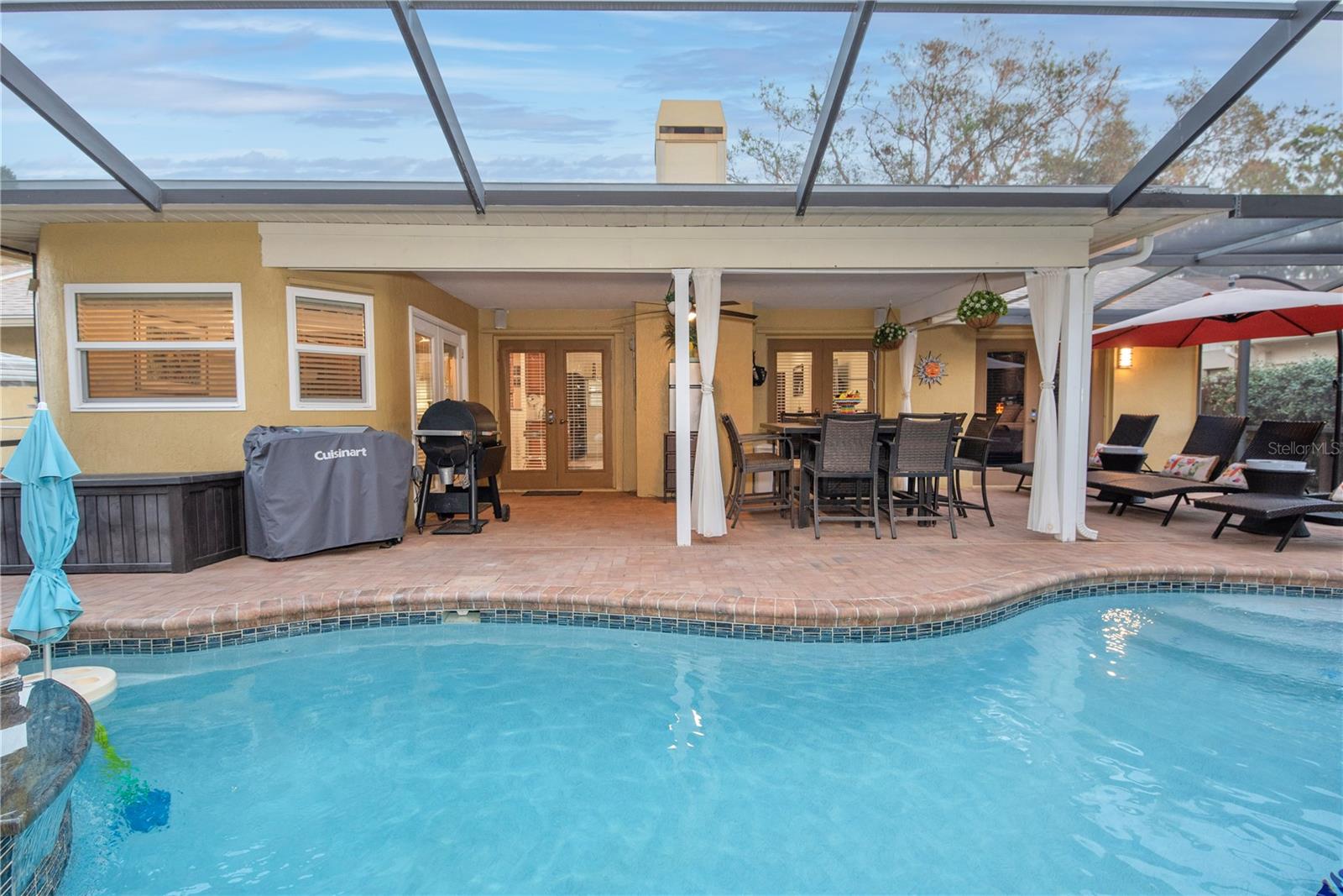 Pool lanai with covered porch.