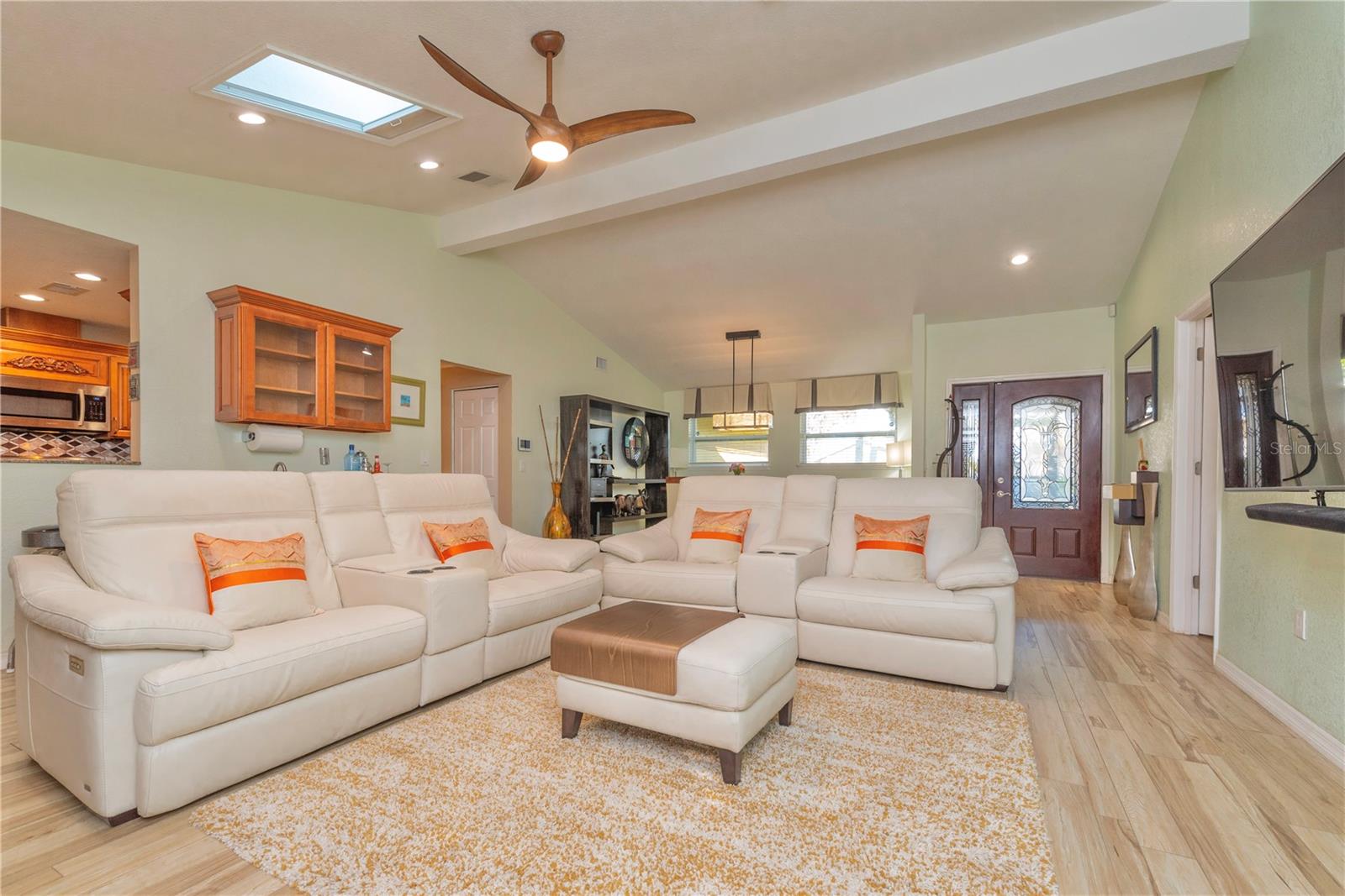 Vaulted ceilings in the living and dining rooms.