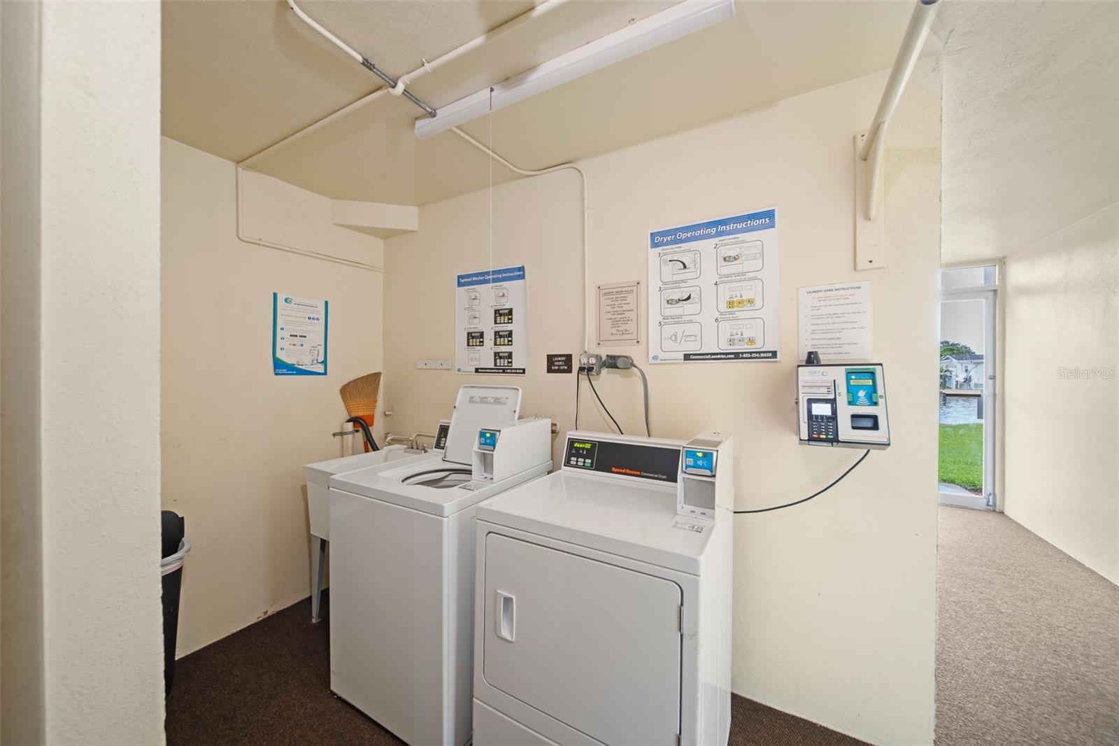 Laundry room with storage closet