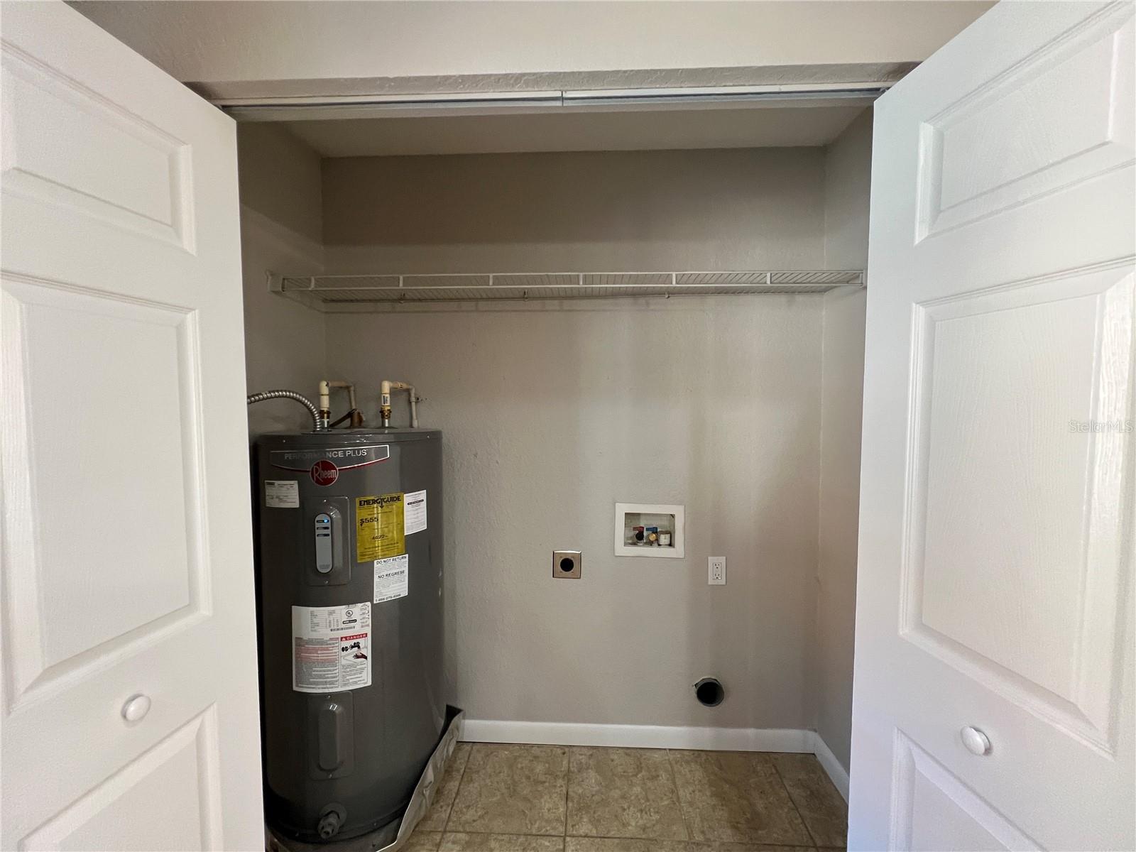 Laundry closet in kitchen