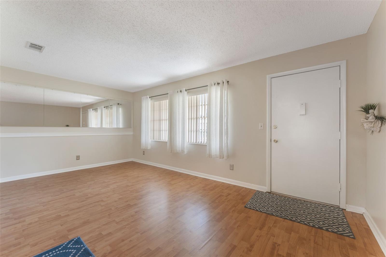 Living room looking toward back door