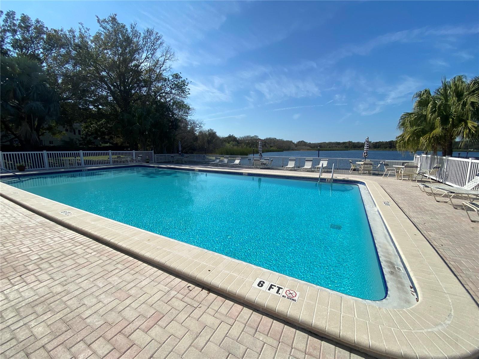 Large Heated Community pool, over looks the Lake