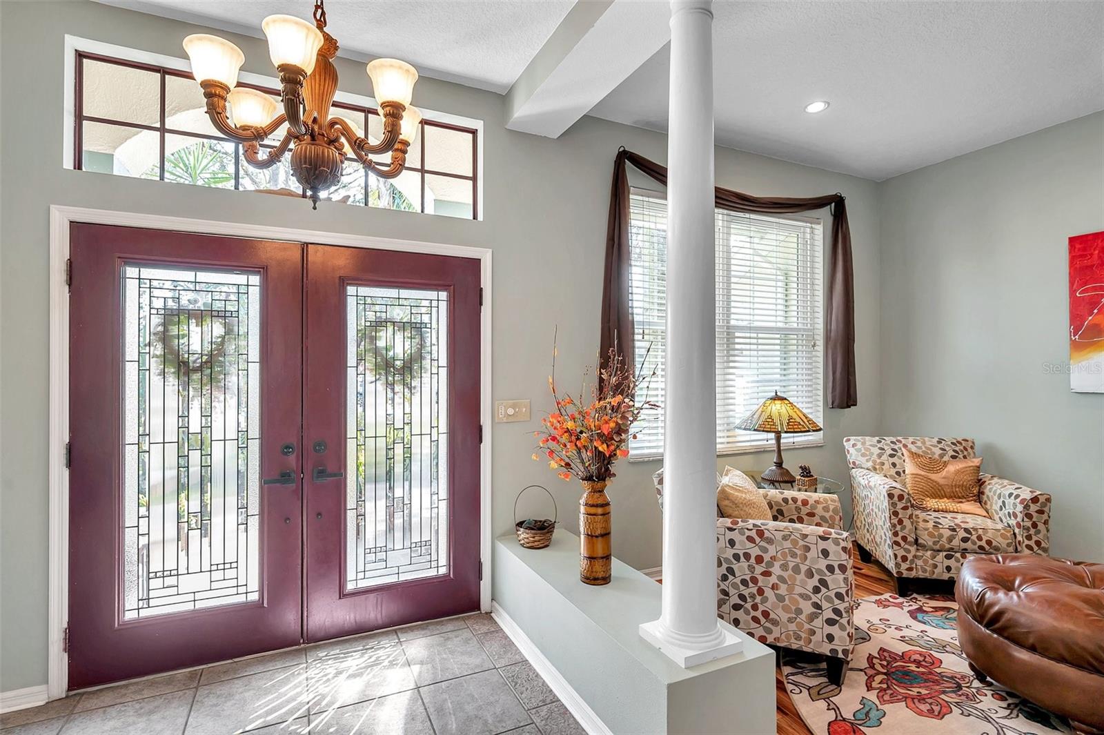 The foyer opens to the the formal living room and dining room combination