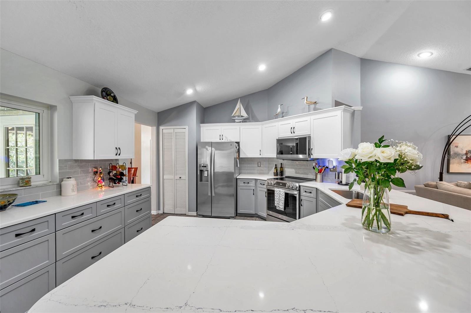 The buffet on your left provides more counter space and cabinets and a pantry provides for your food storage