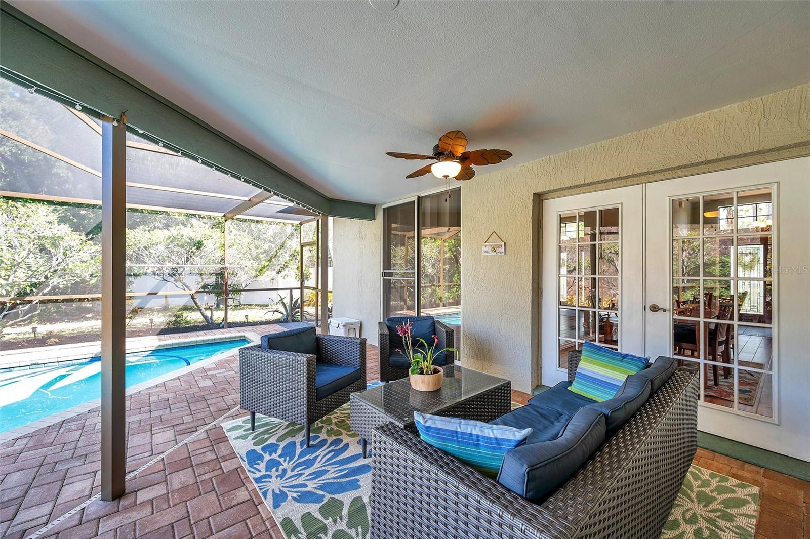 The lanai and pool deck have been refinished in beautiful pavers