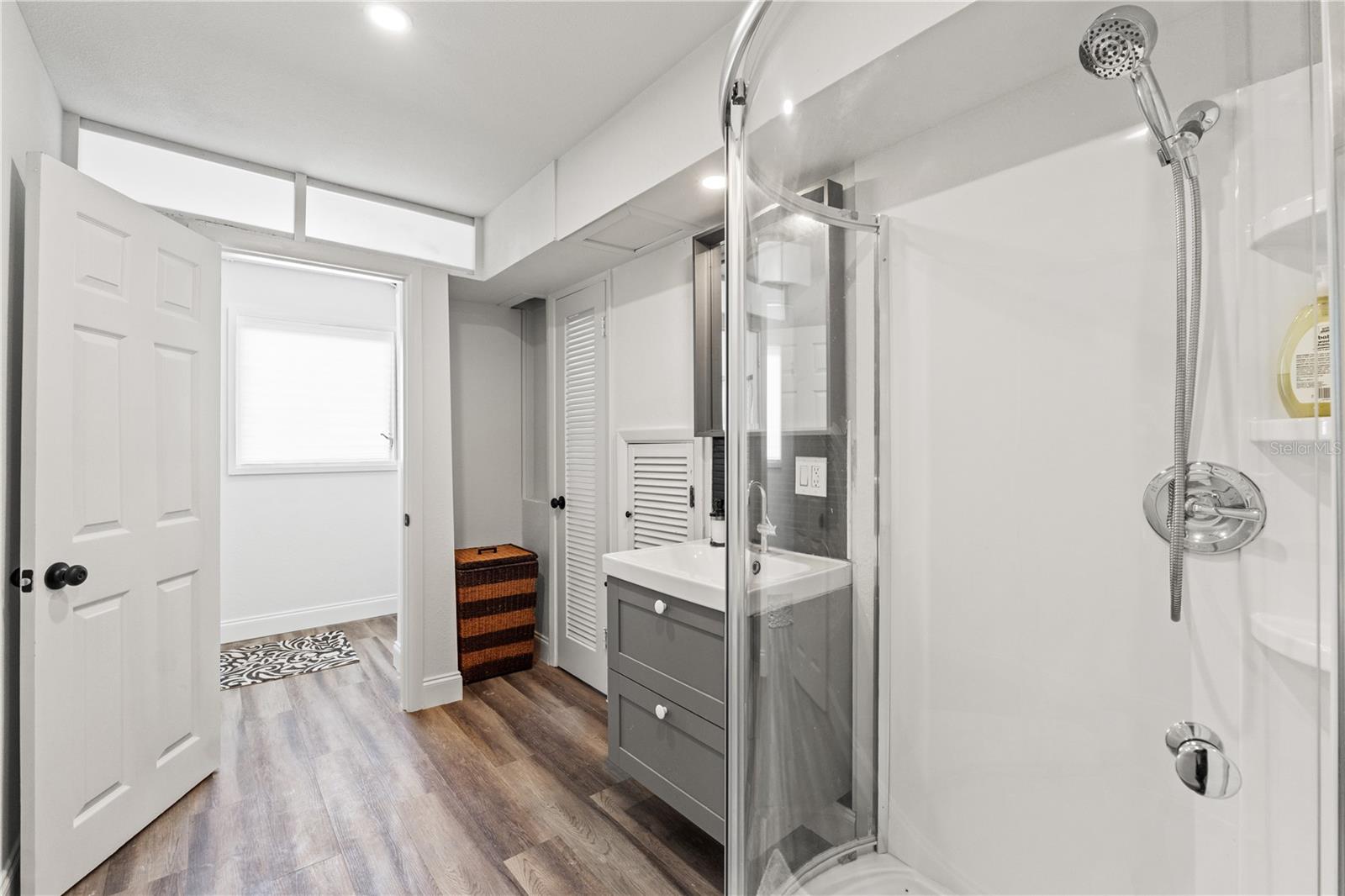 Converted full bathroom with laundry chute