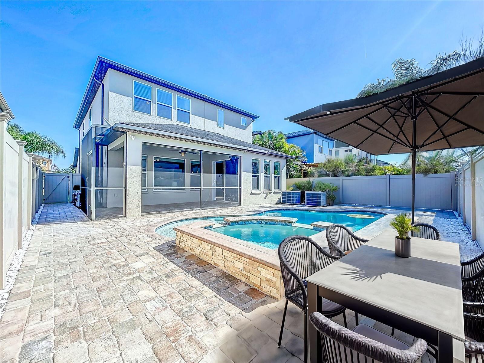 Backyard pool 6 feet depth, brick pavers throughout. (furniture was virtually staged)