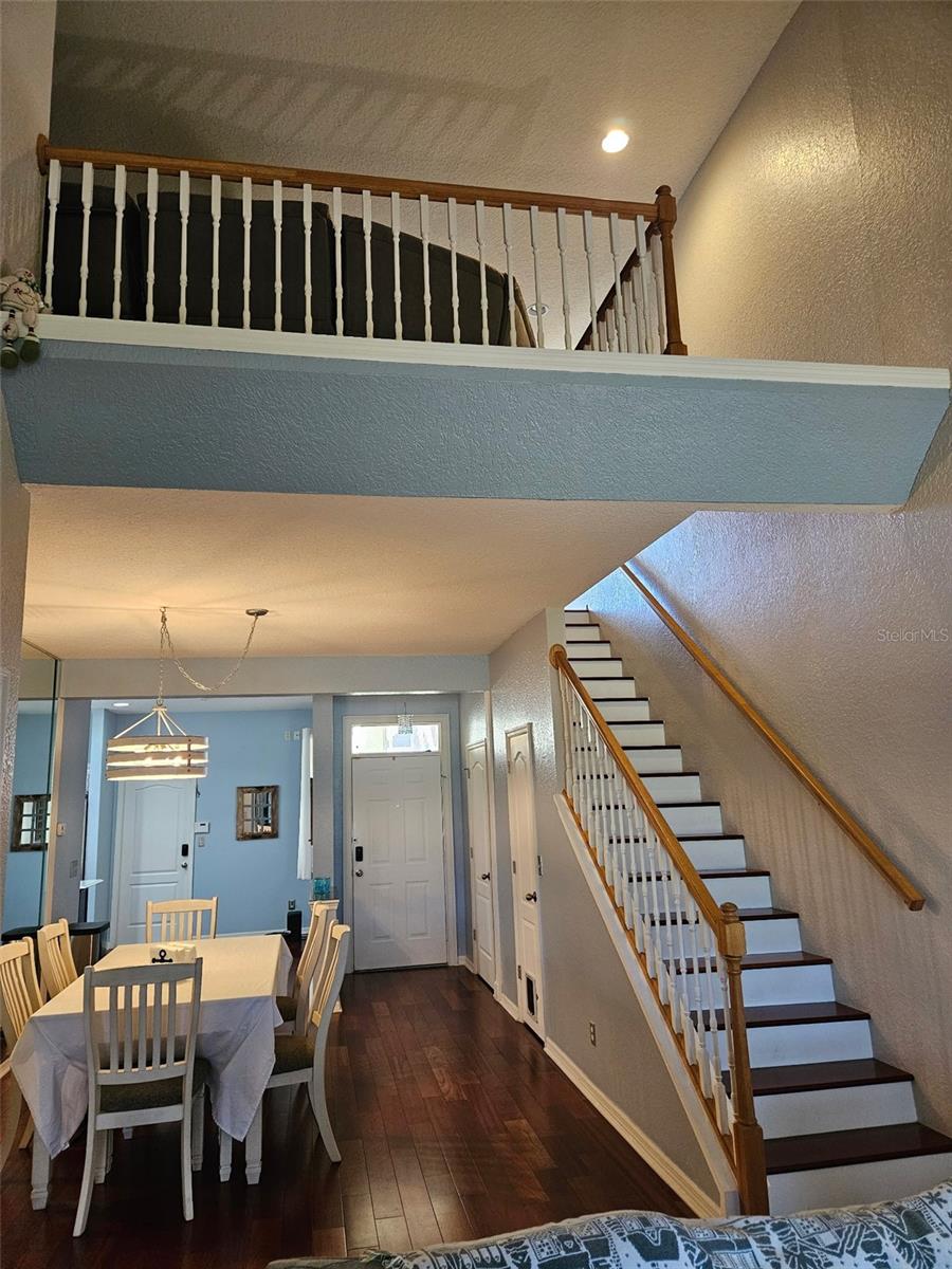 Loft living area overlooks downstairs living area