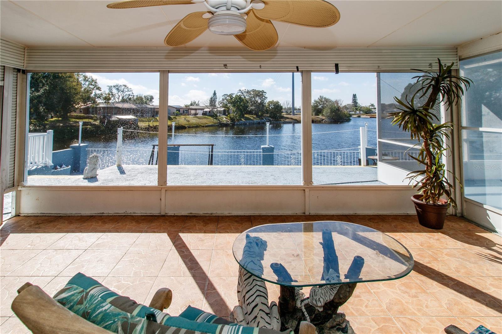 Waterfront screened patio with Hot tub