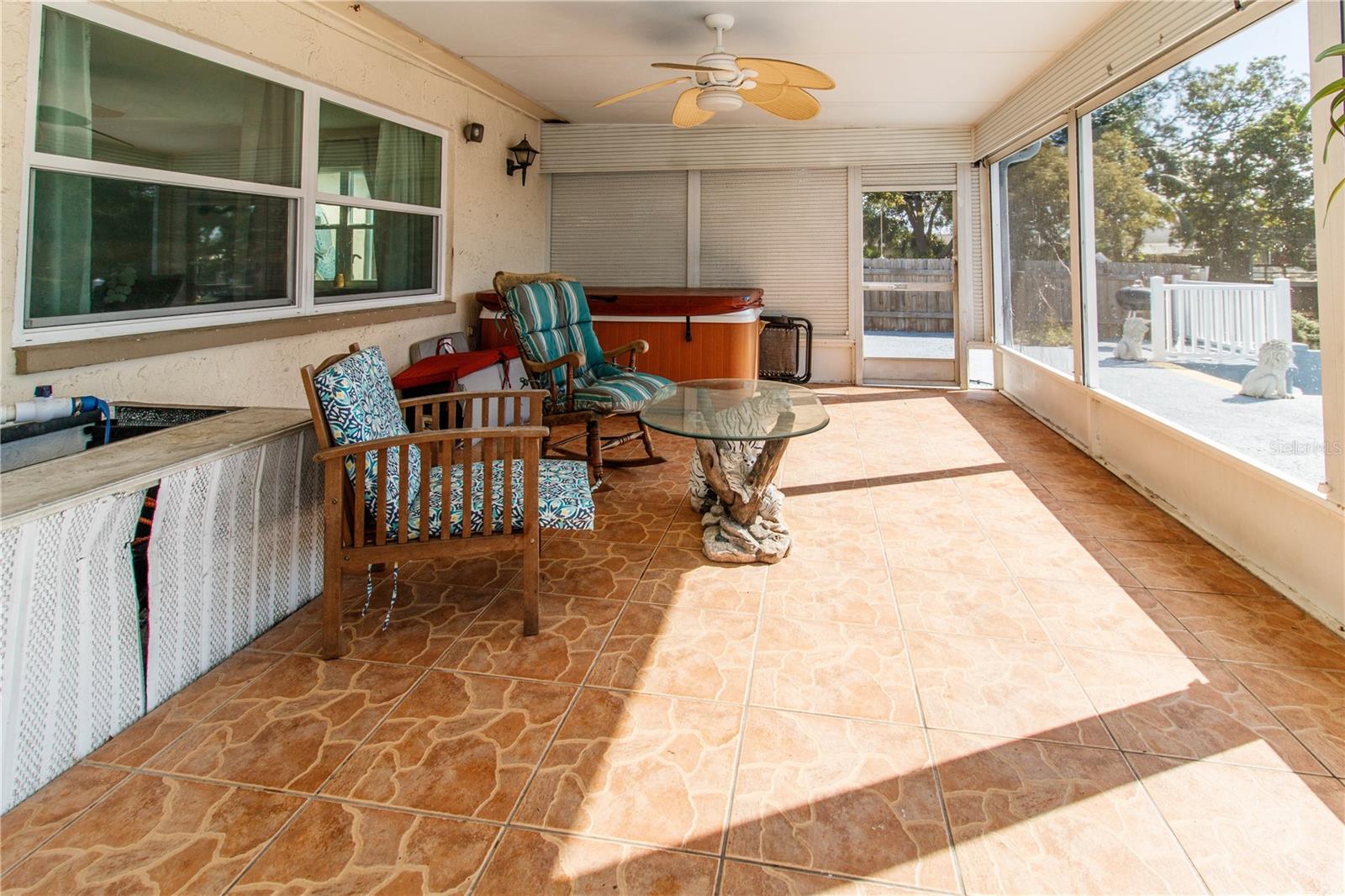 Waterfront screened patio with Hot tub