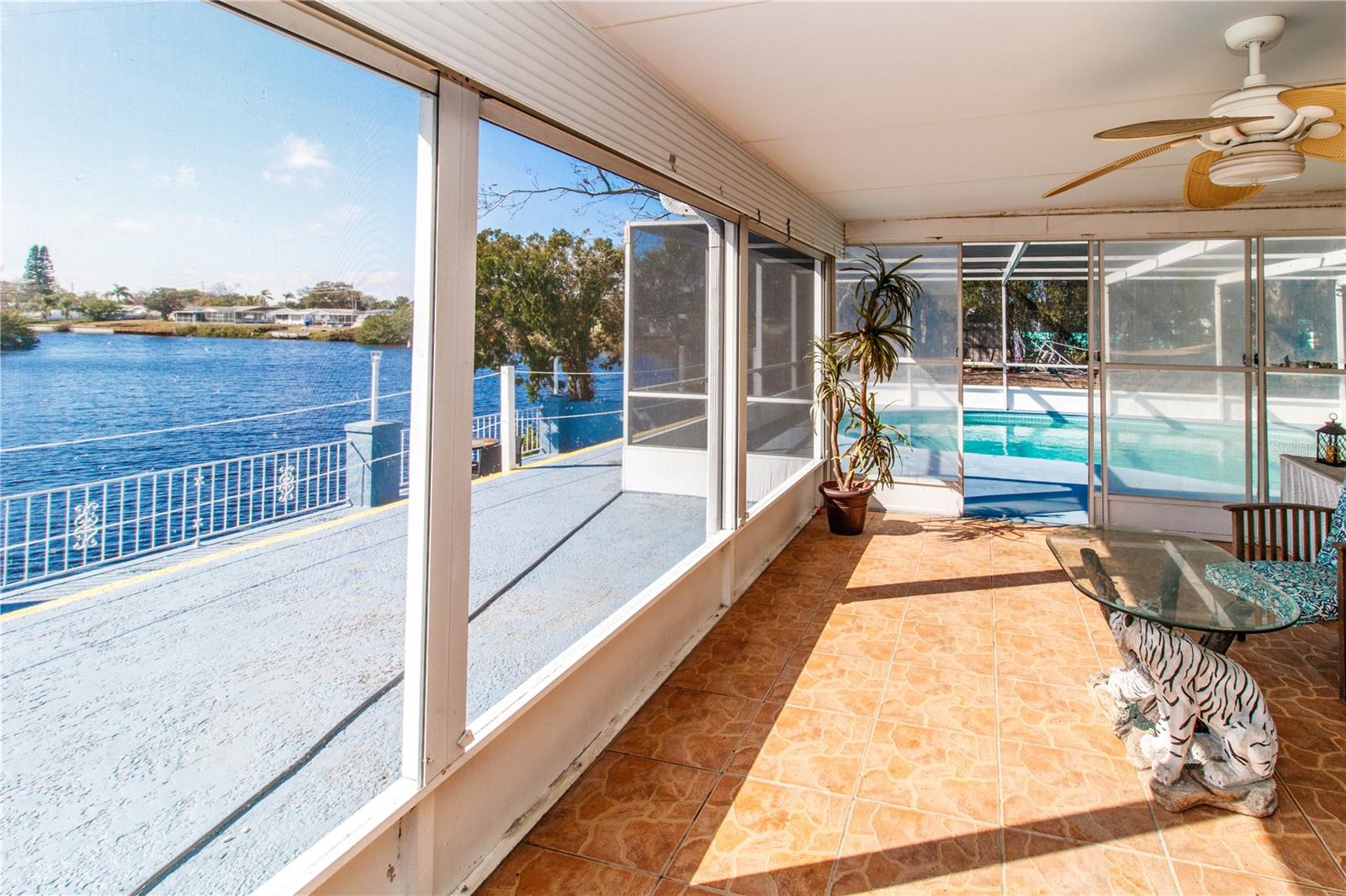 Waterfront screened patio with Hot tub