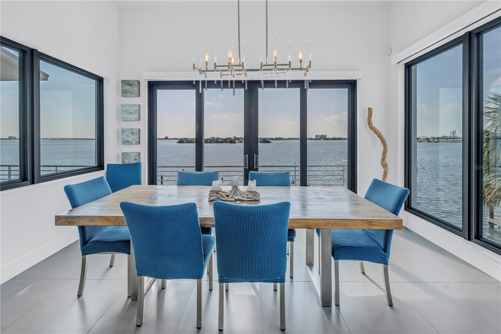 Lovely dining area with walkout to balcony.