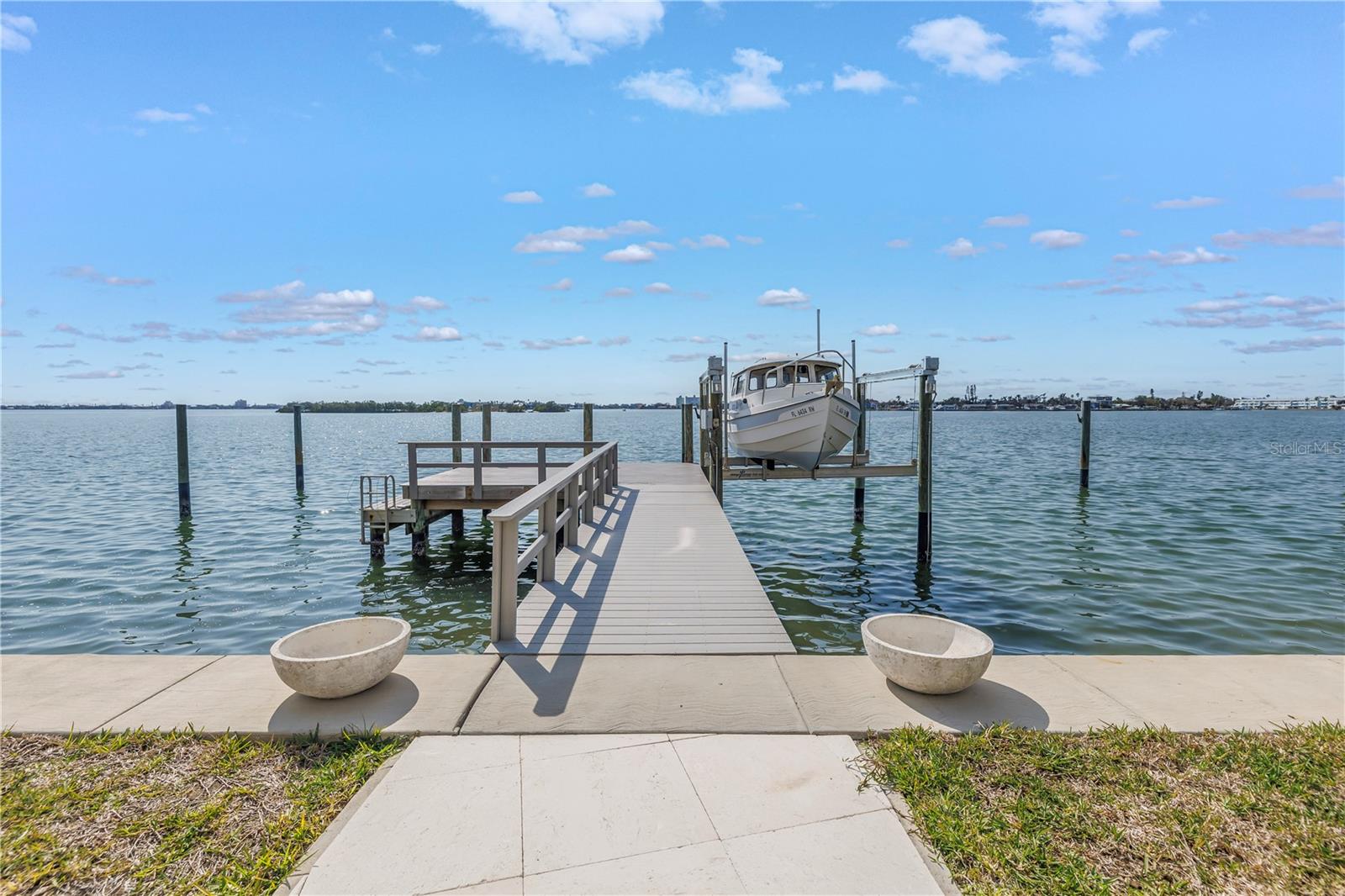 Composite dock with boat lift.