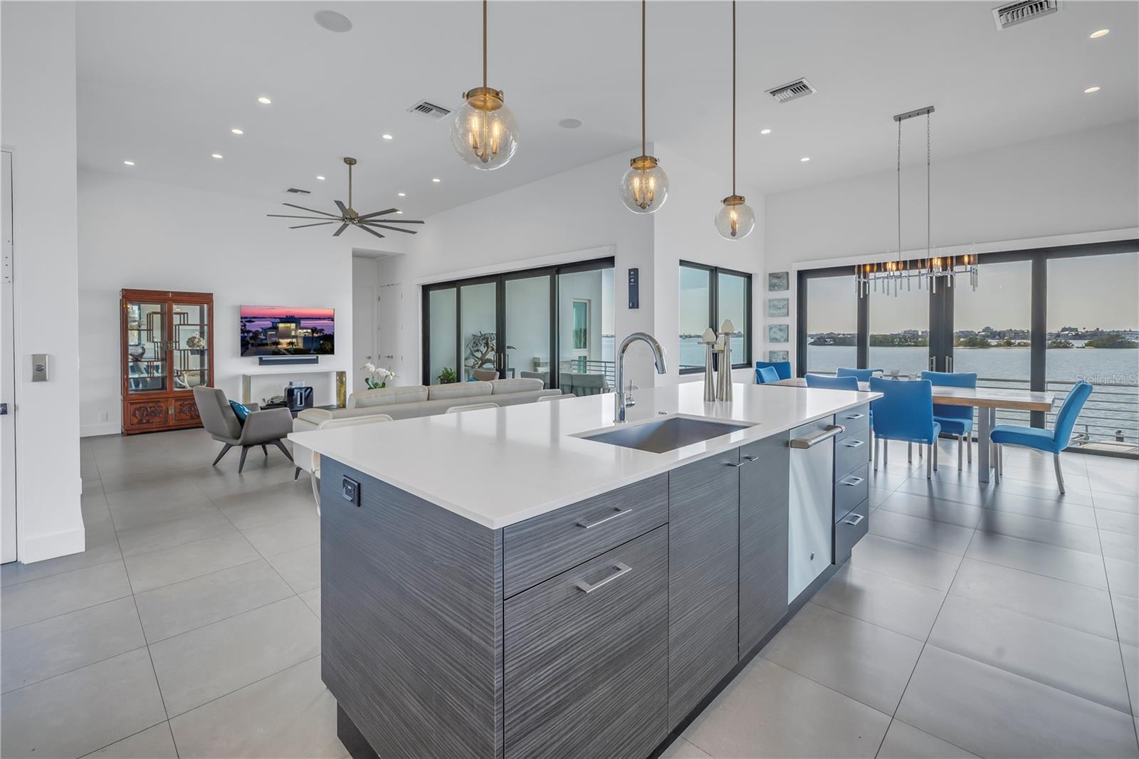 Recessed lighing throughout main living area and pendant lighting over the bar.