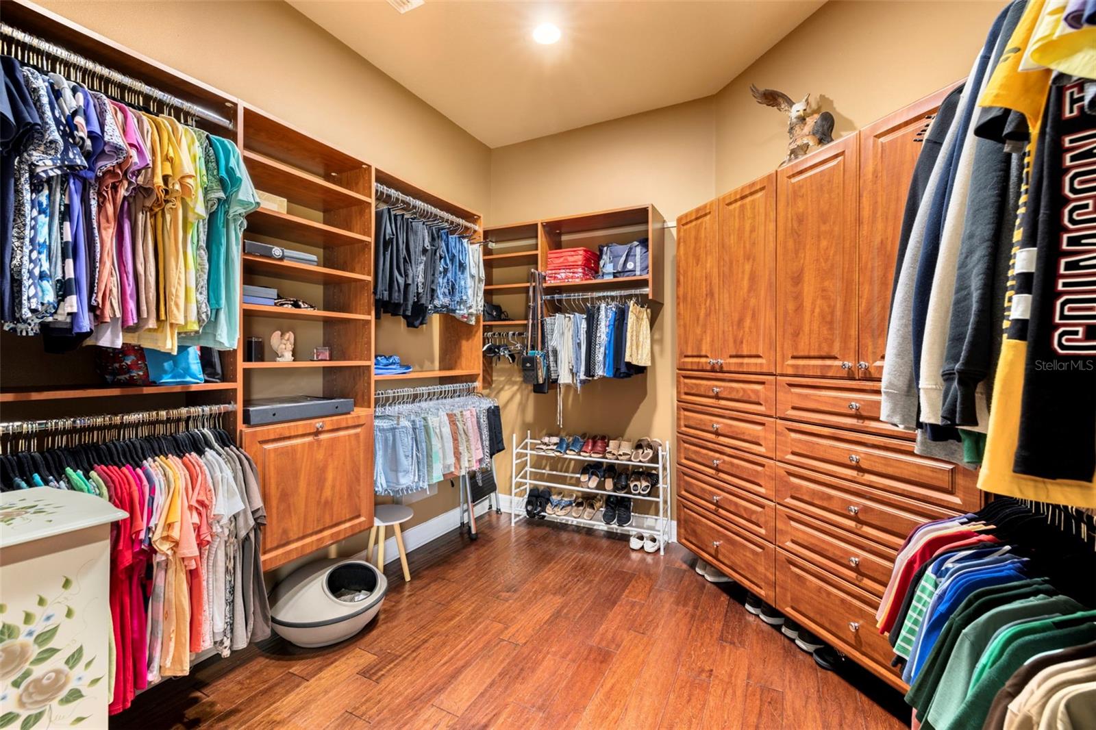 Massive sized walk-in closet w/custom closet organizers