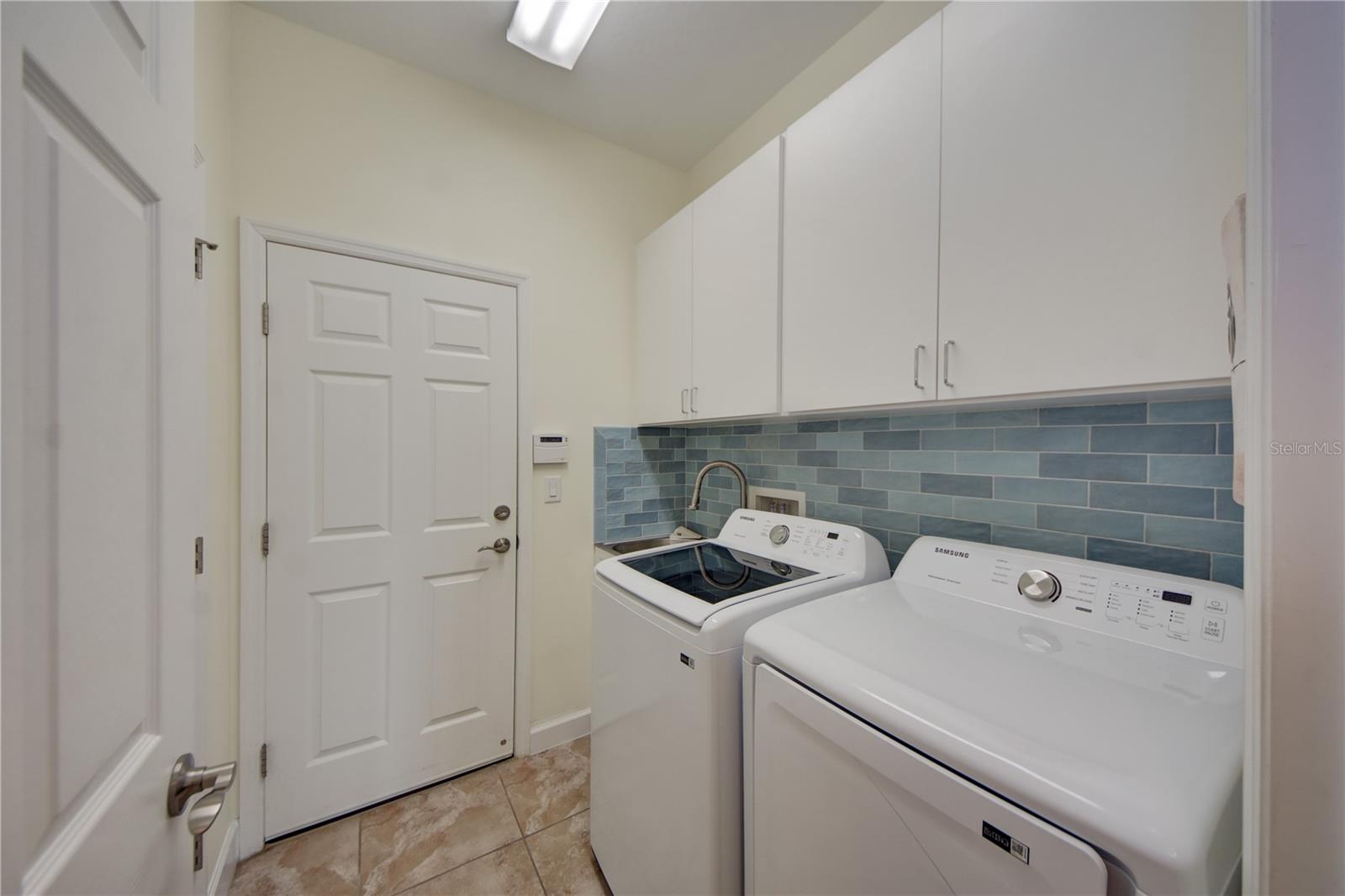 Indoor Laundry Room W/ Utility Sink