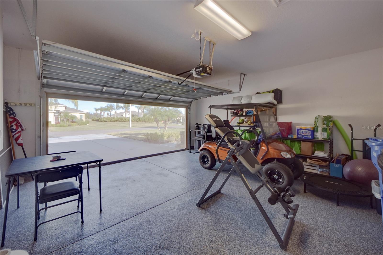 Garage with Screen and Epoxy Floor