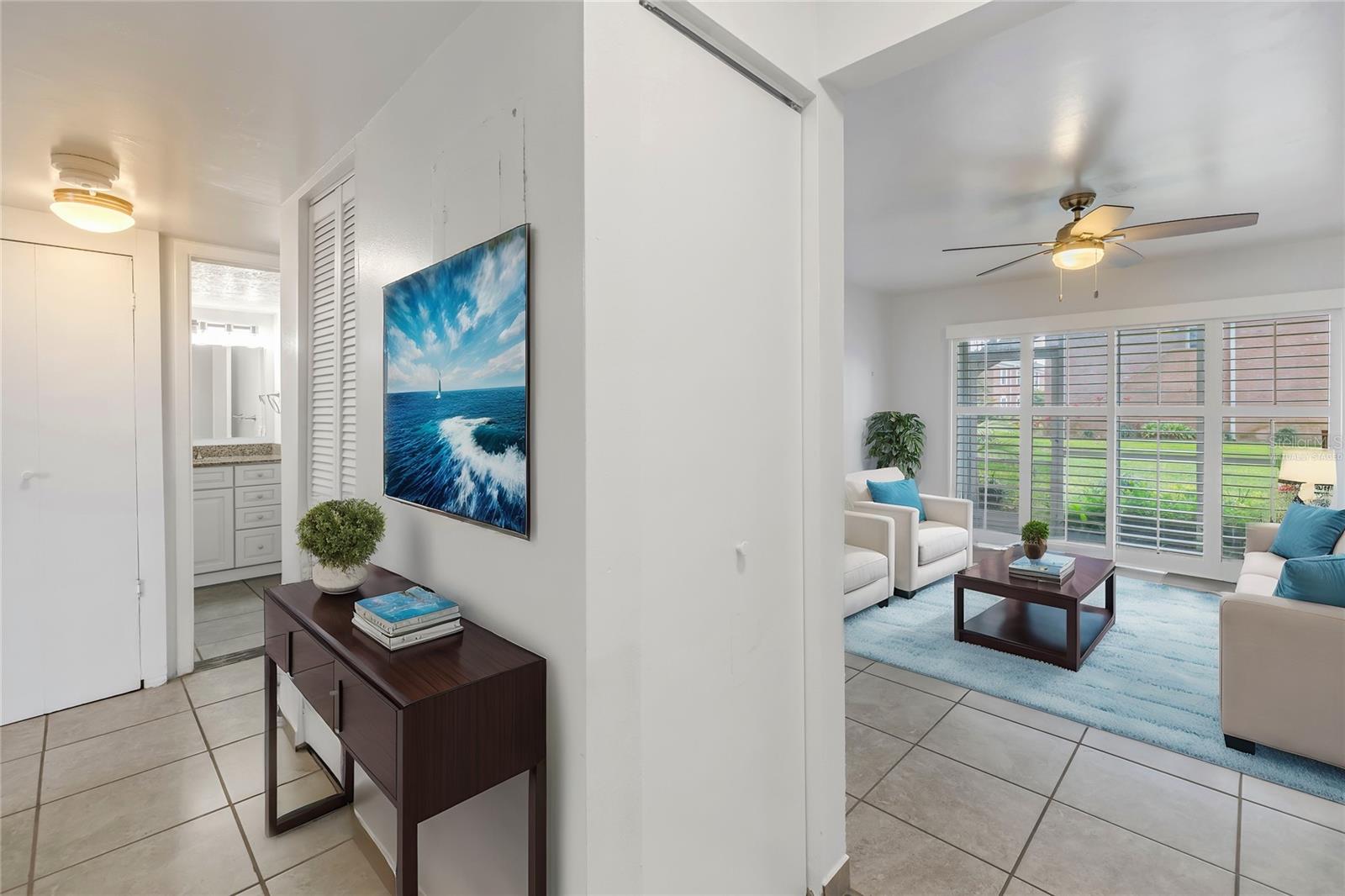 Virtually staged front entry way.