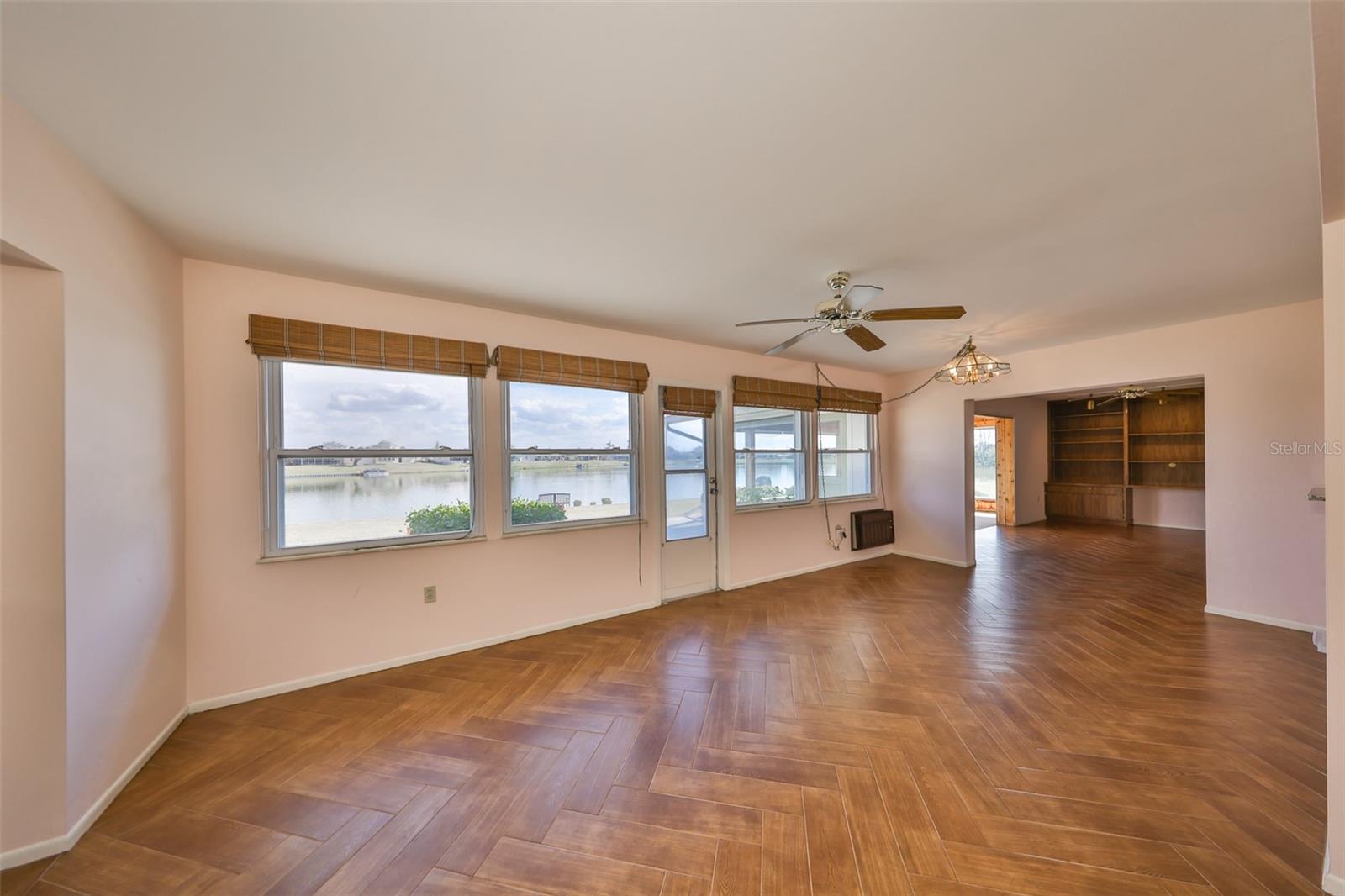 The view from the Florida Room with the Herringbone wood looking tile floor.  This room is perfect for your crafts or hobbies.