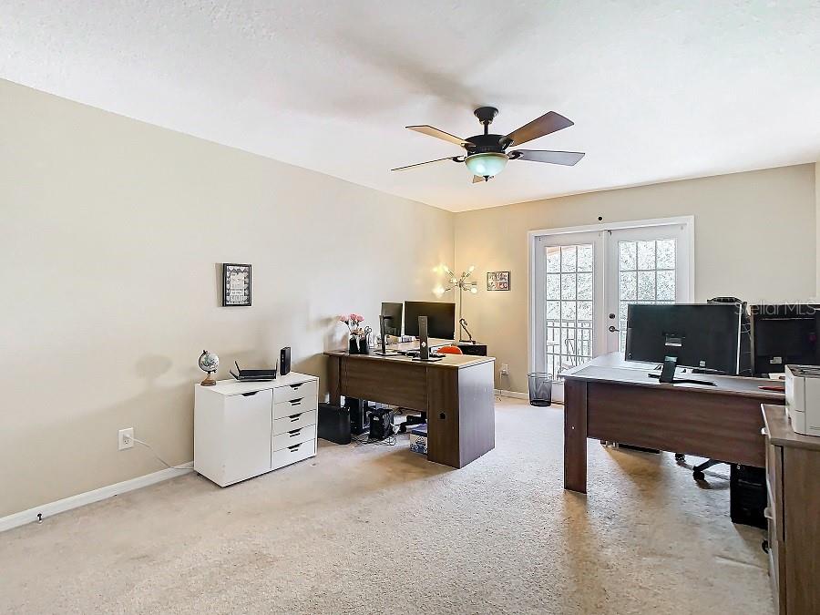 Upstairs office with french doors to balcony