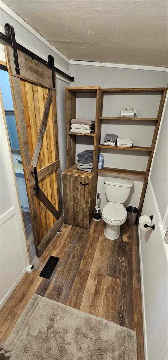 Custom Barn Door Slider to Private latrine & shower