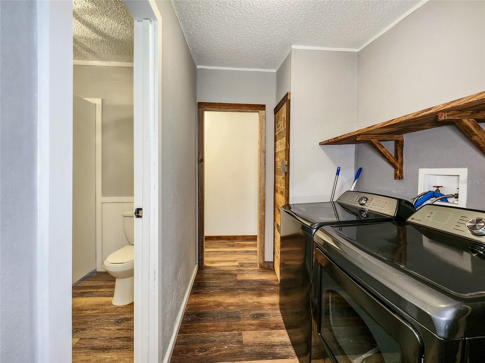 Laundry Room/Corridor next to GUEST Bathroom