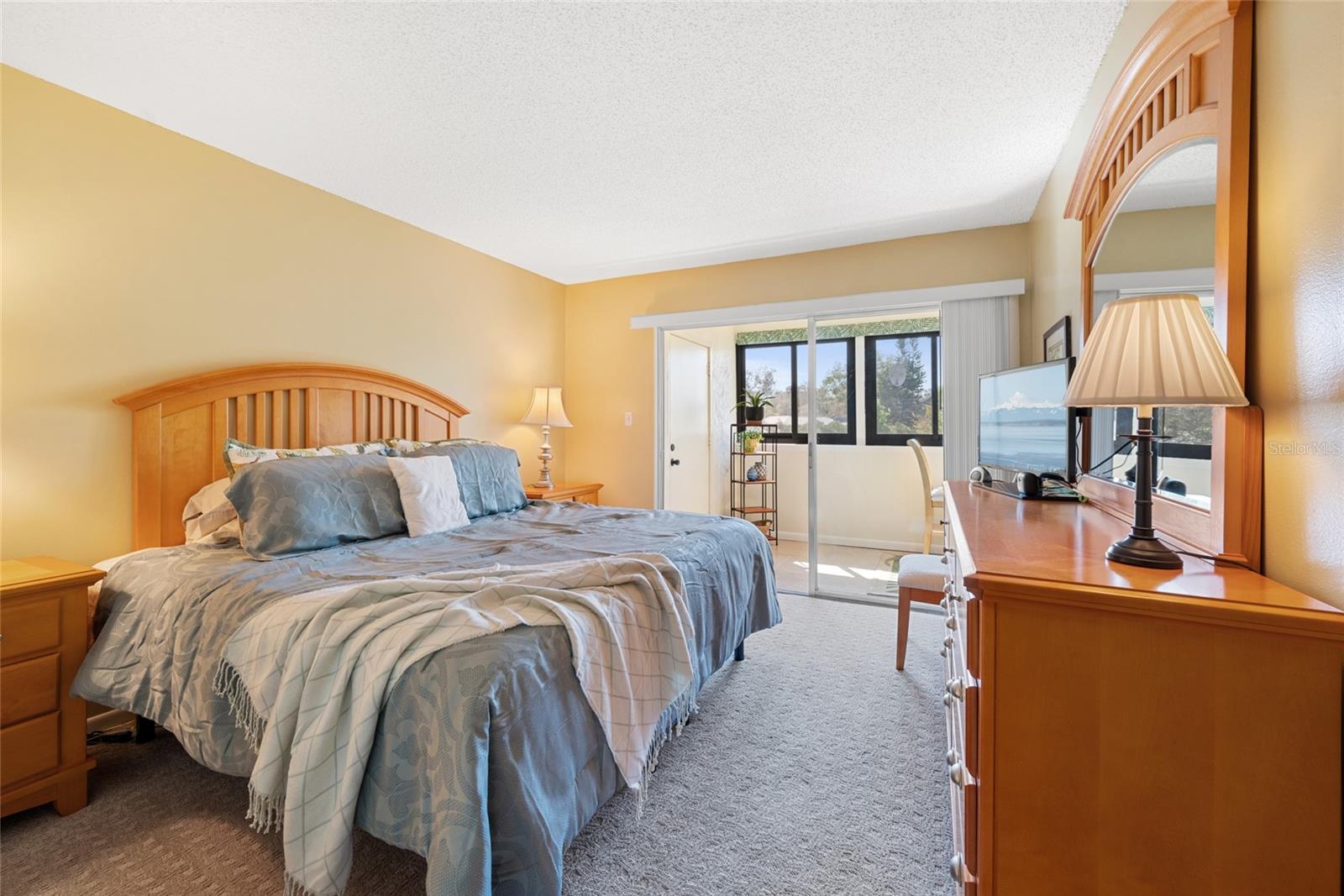 Main Bedroom with sliders to additional living space