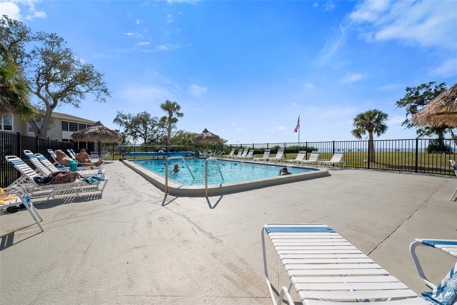 Enjoy a view of the Gulf from the refreshing community pool