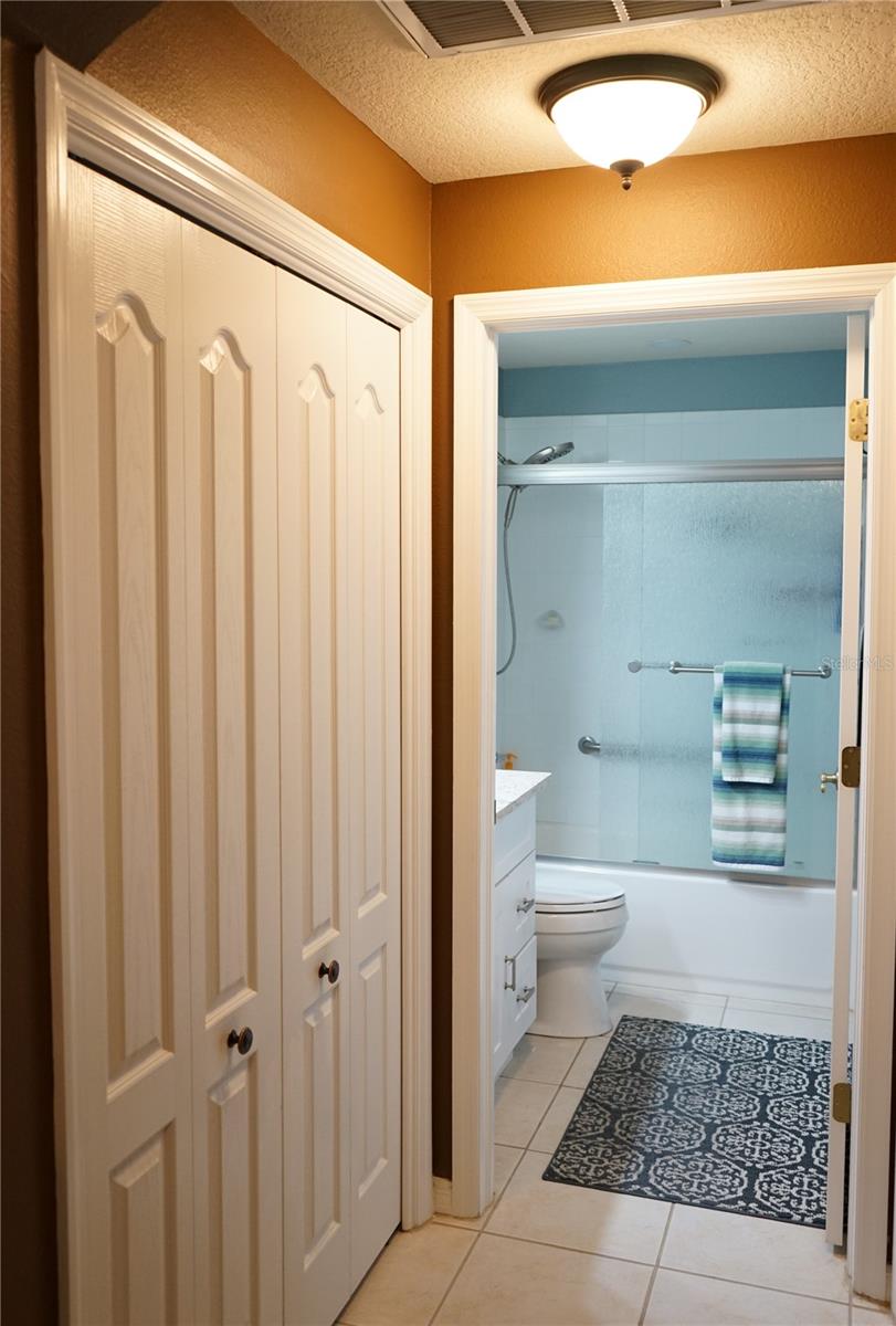 linen closet at hall bath