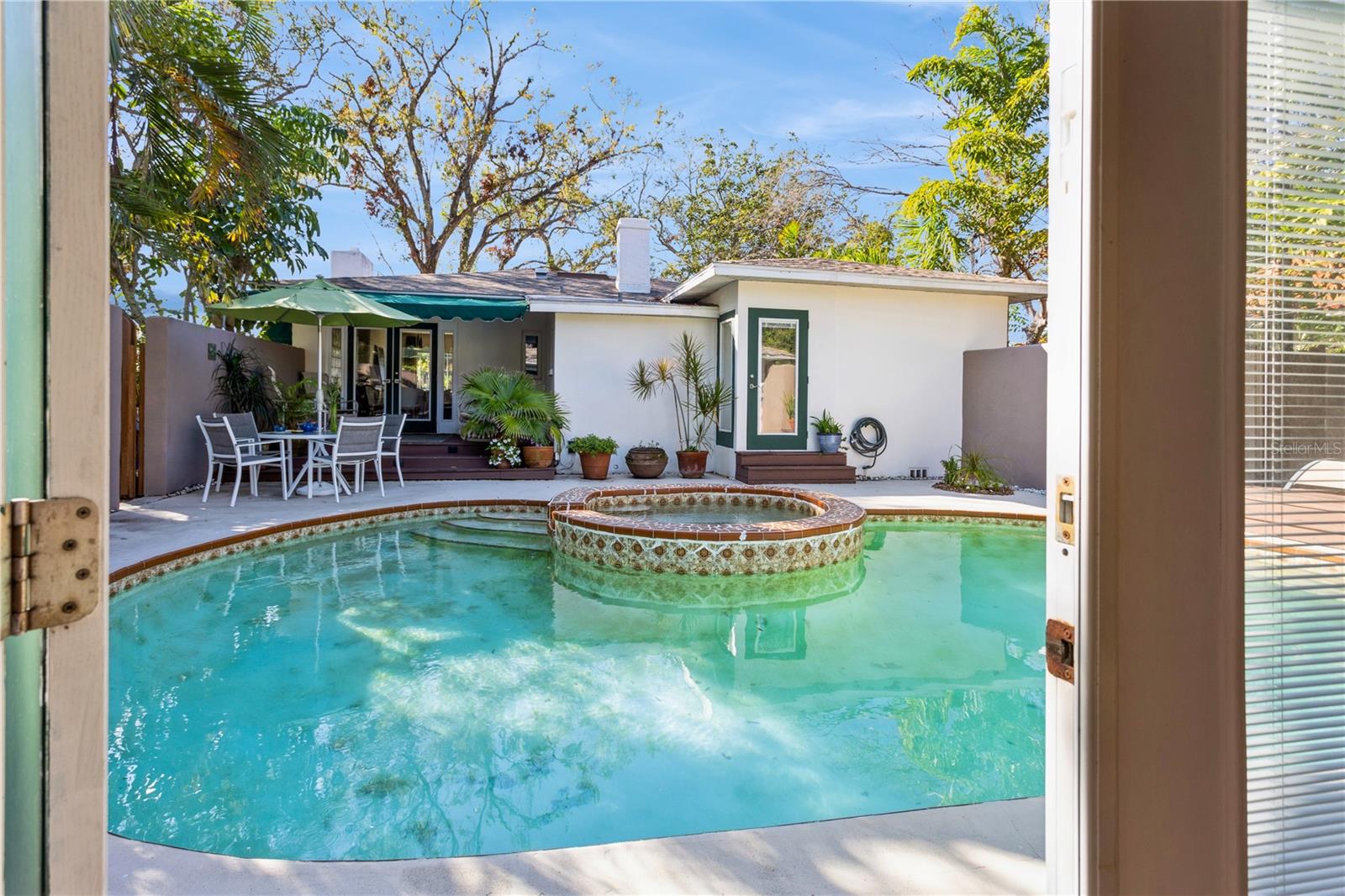 Pool house overlooking the pool