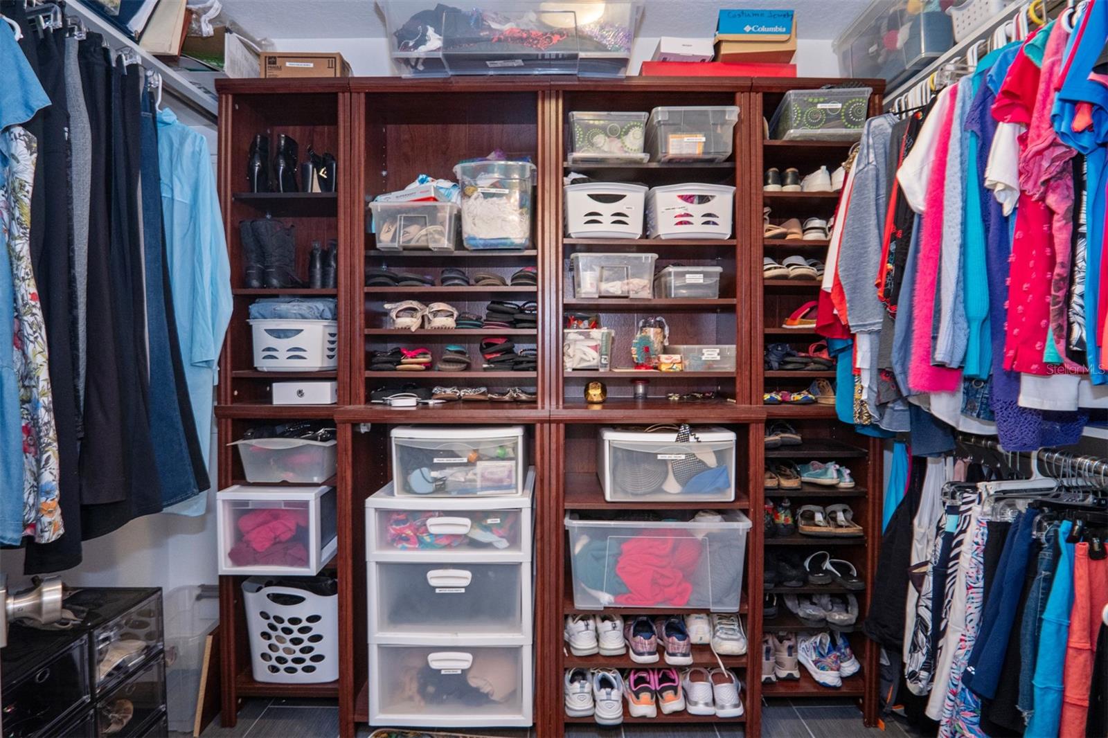 Primary Bedroom Walk-in Closet Organized