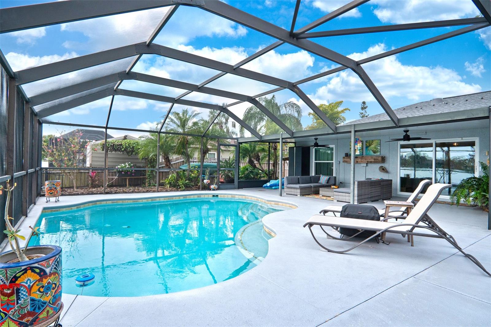 Screen Enclosed Pool with Sitting Area