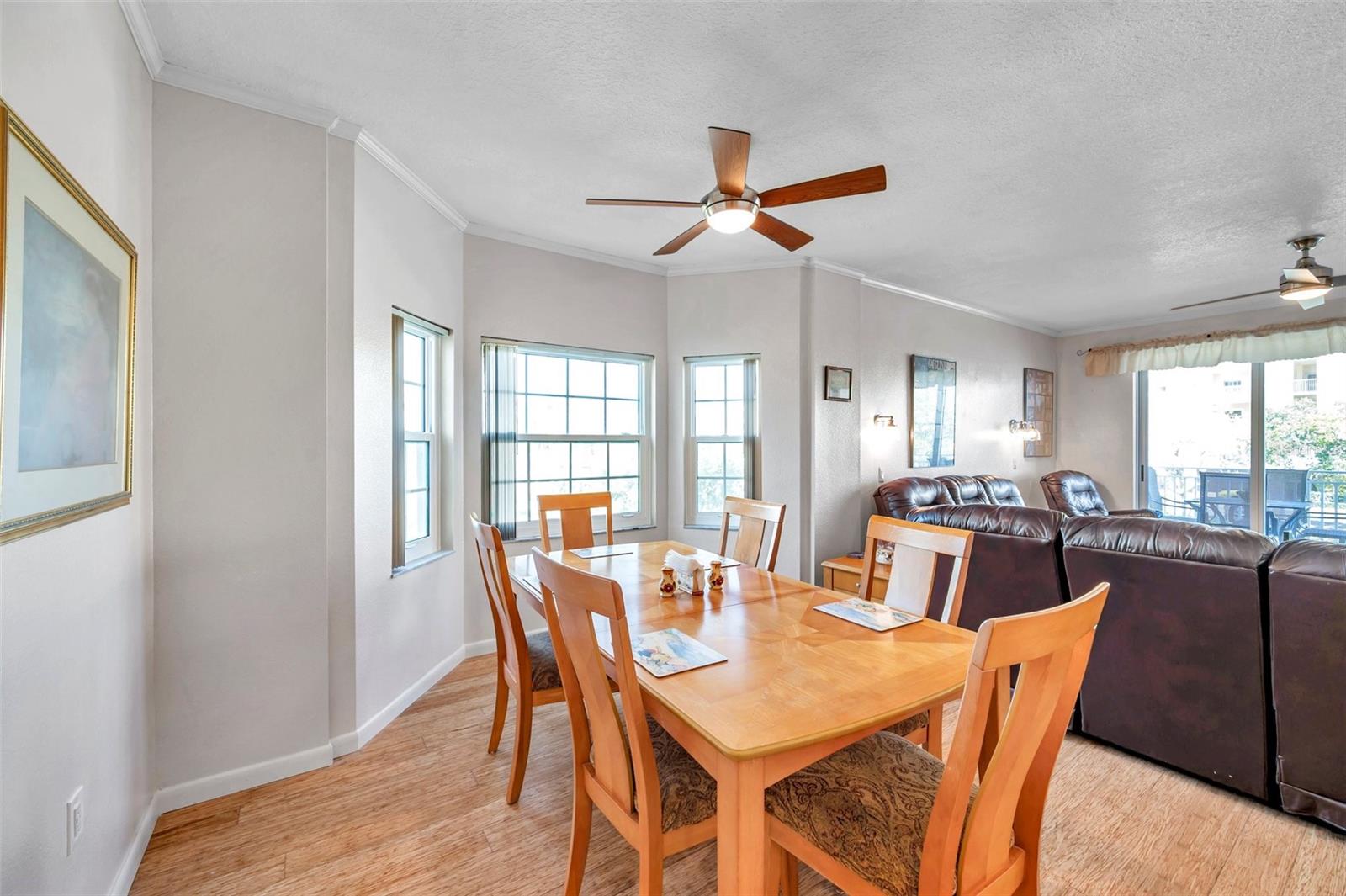 The light and bright Living room/dining room combo featuring a bay window