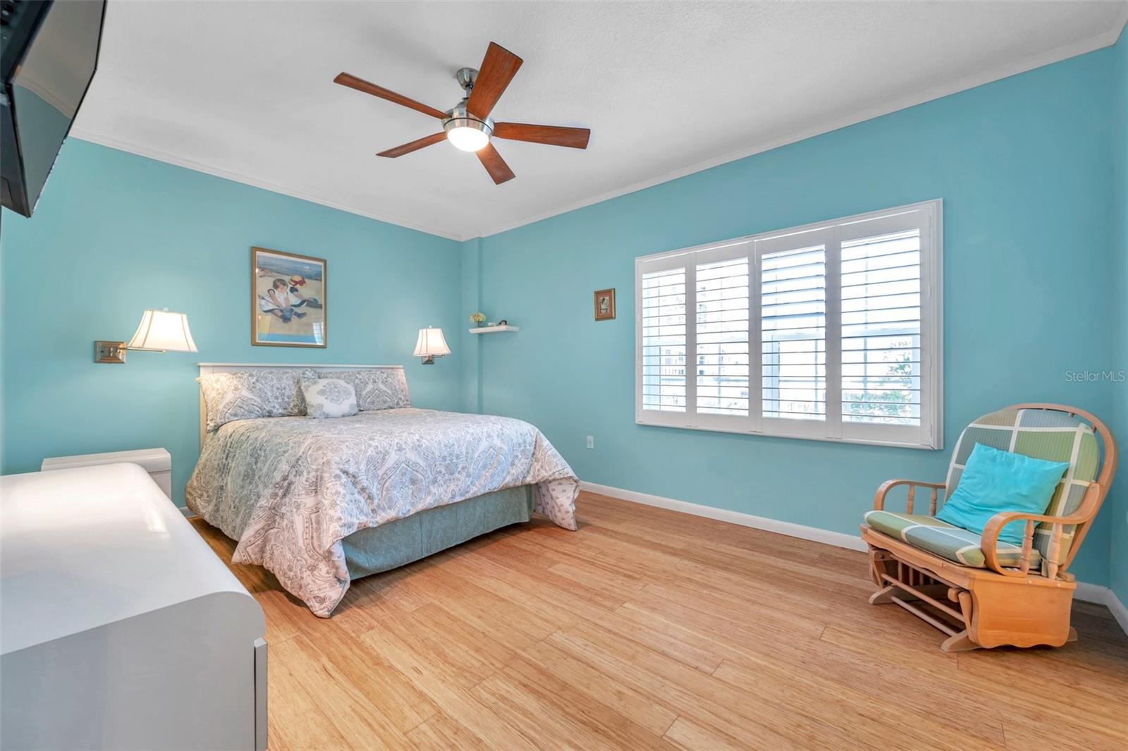 the huge 2nd bedroom features plantation shutters