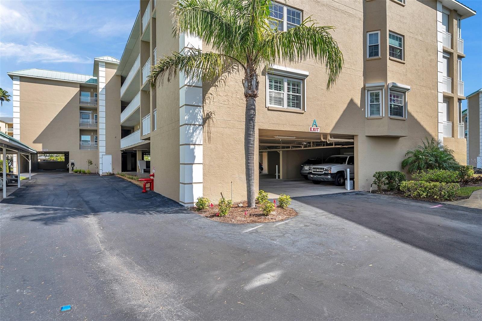 The unit has an underbuilding parking spot and storage room