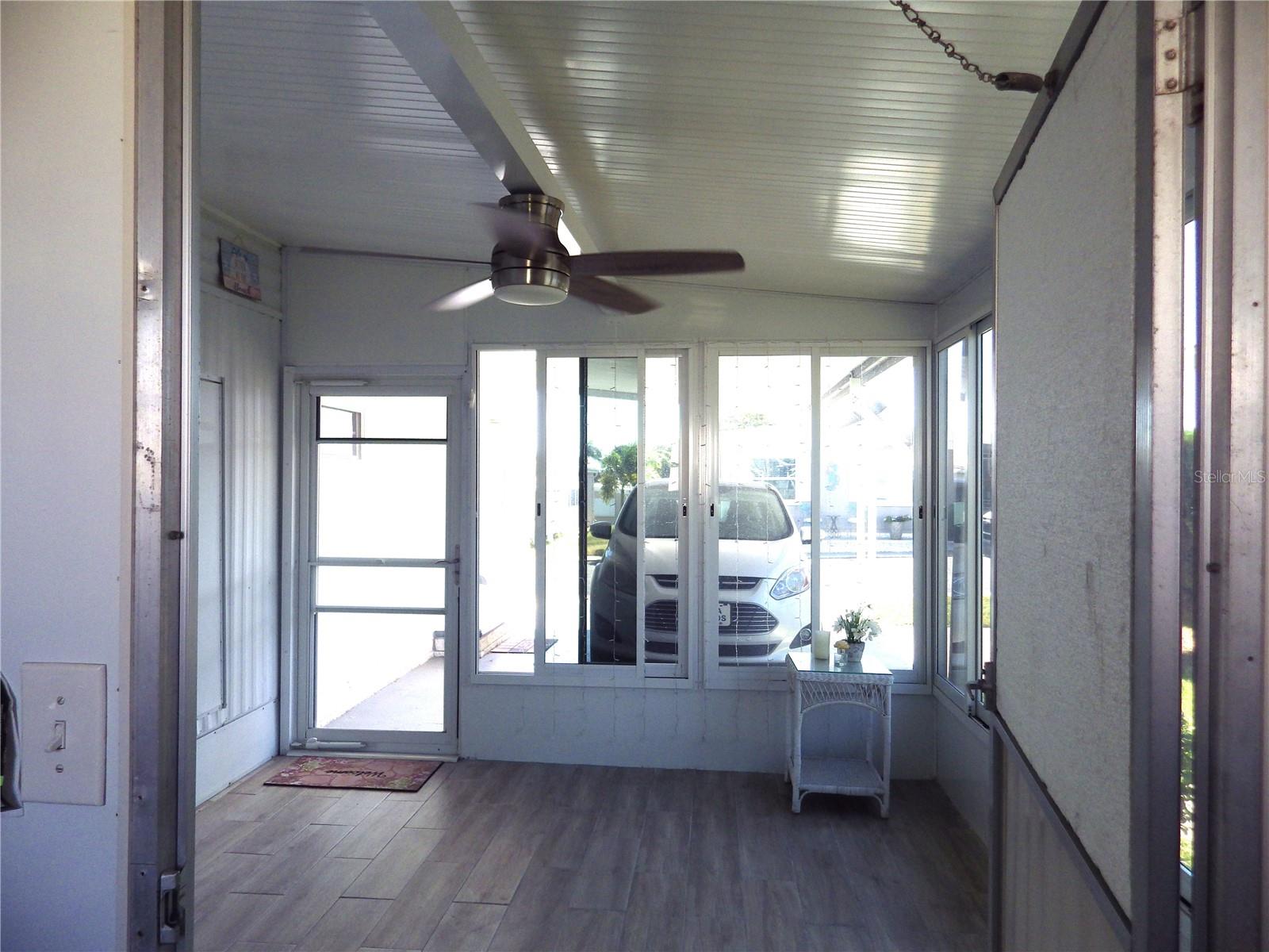 Lanai with sliding glass and screens