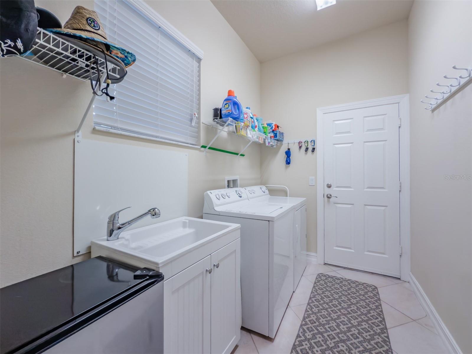 Laundry Room with door leading to Garage.