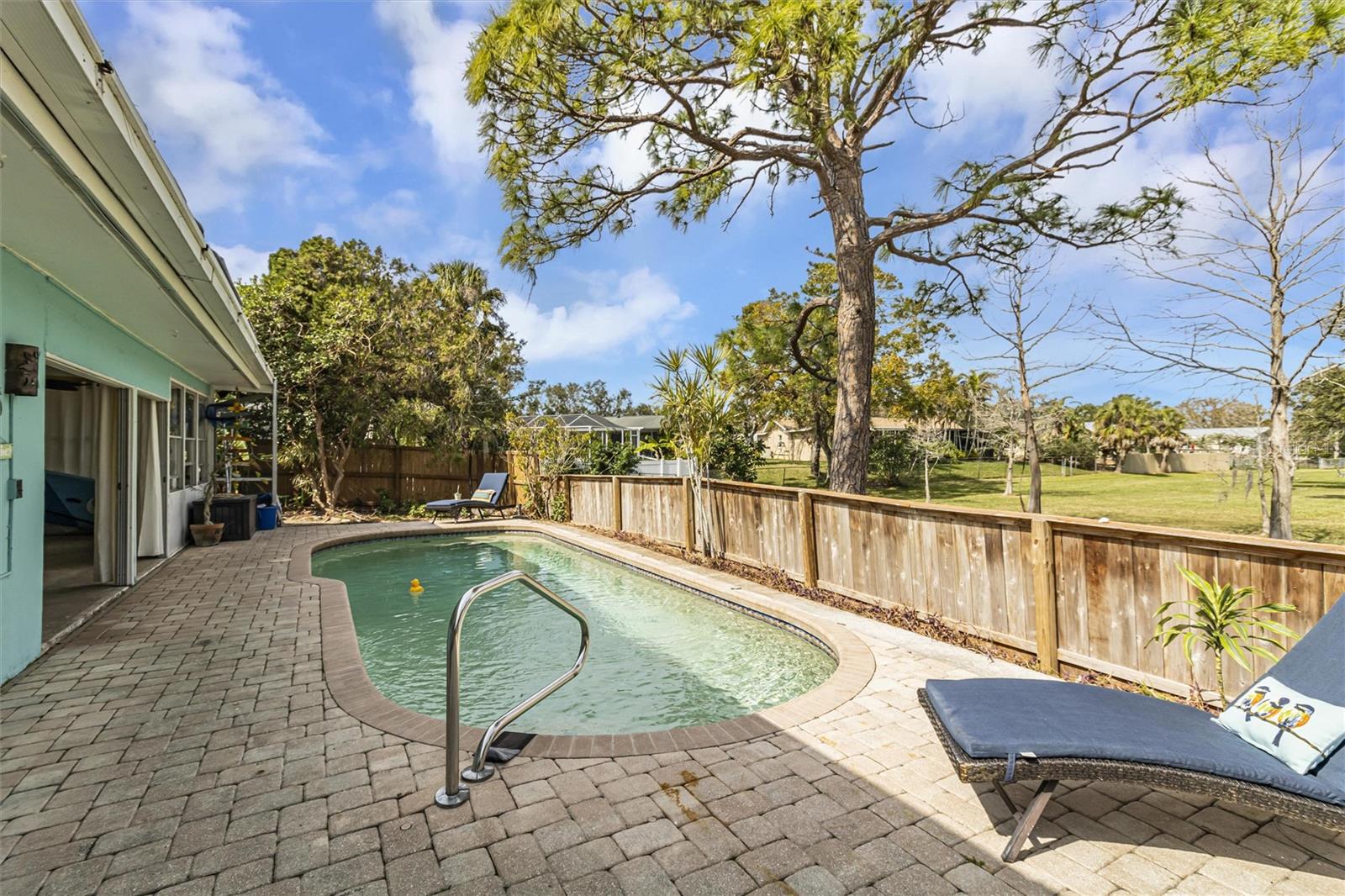 Beautiful pool - pool lining is Diamond Brite with row of deco tiles at waterline