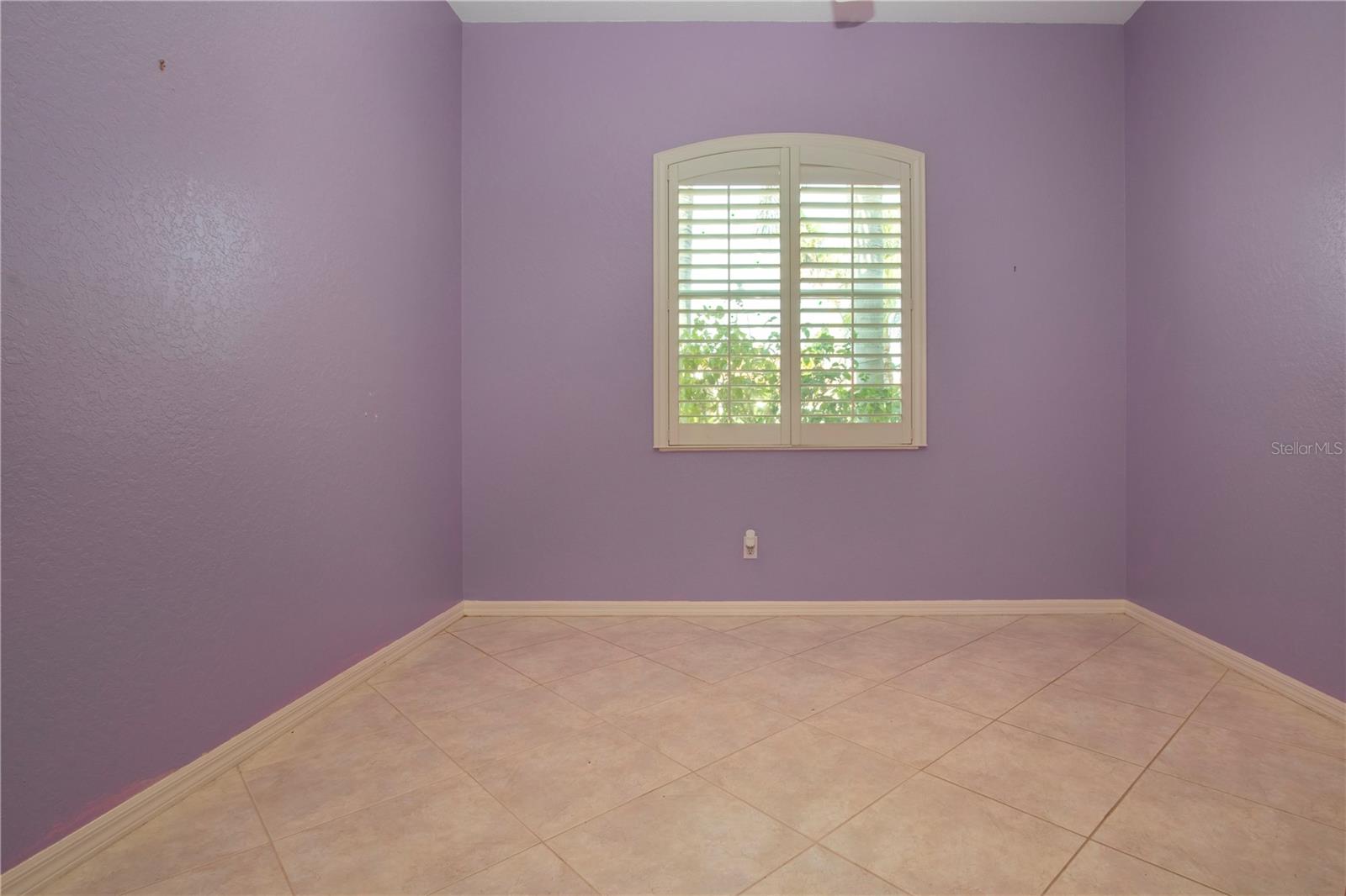 2nd bedroom with planation shutters