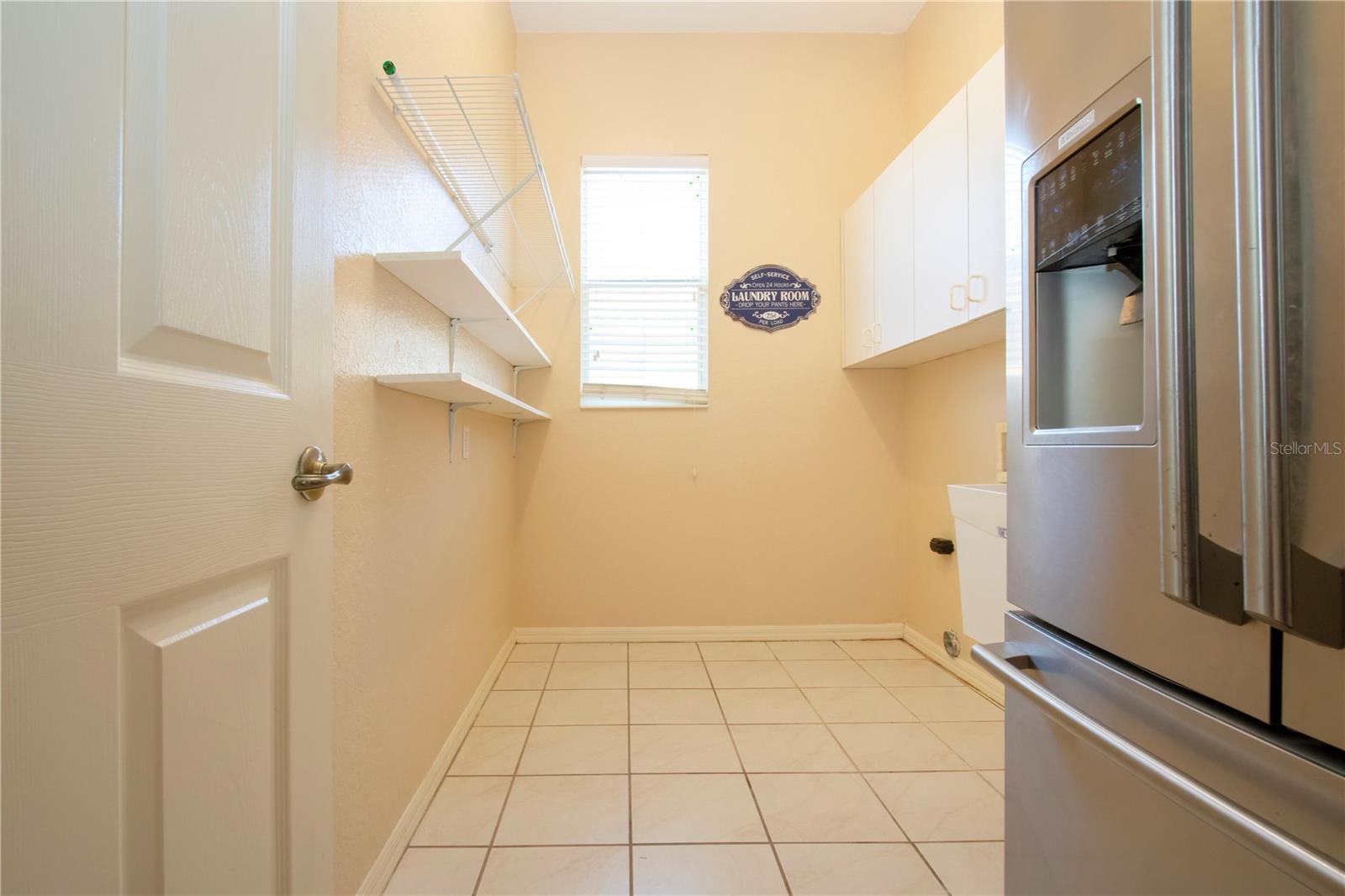 Utility Room with 2nd refridgerator