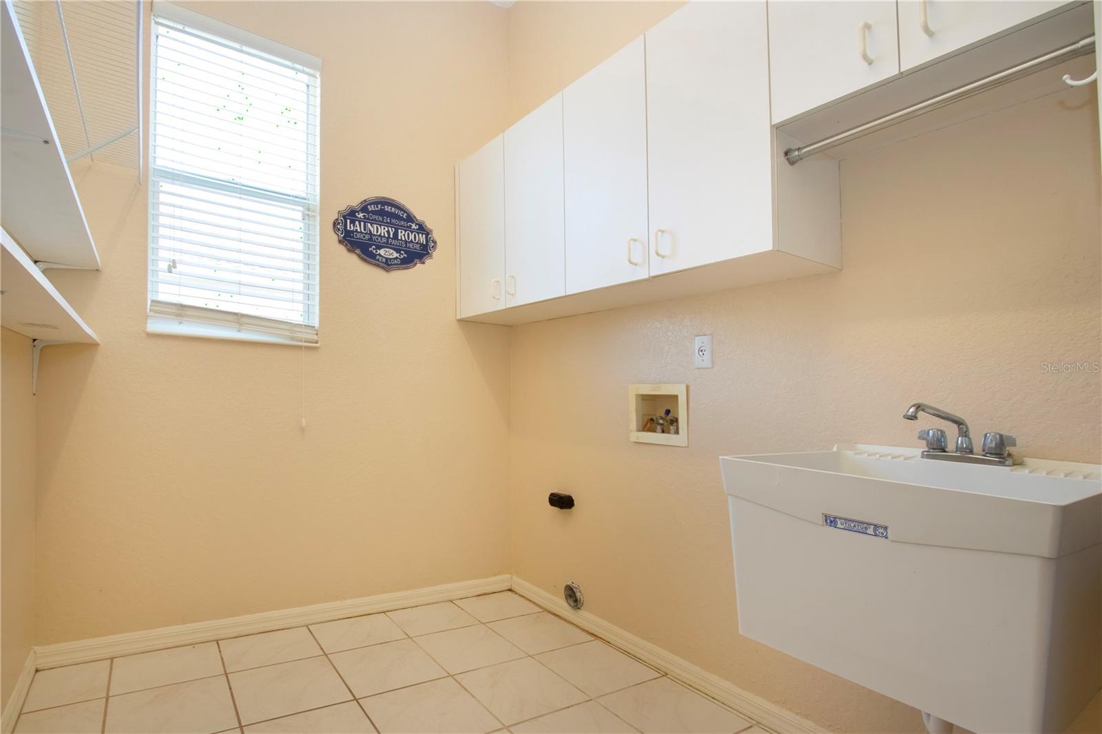 Utility Room with Utility Sink