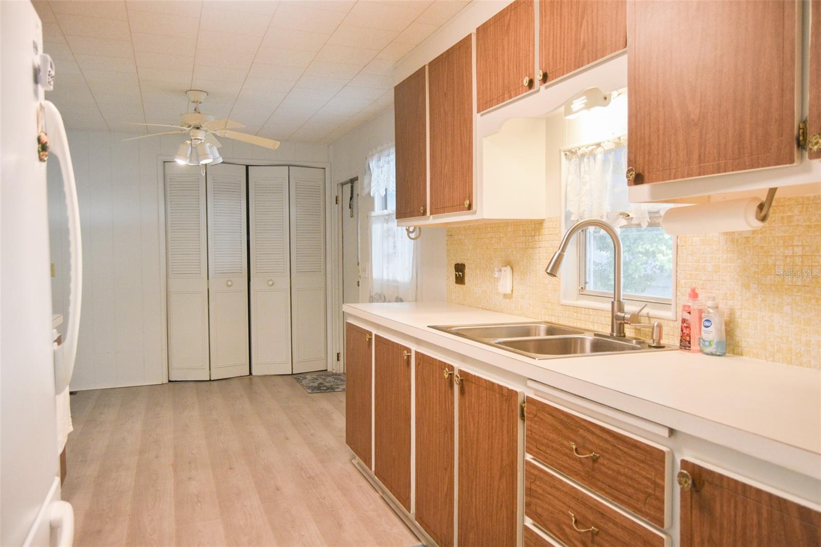 Kitchen showing closet where washer & dryer is