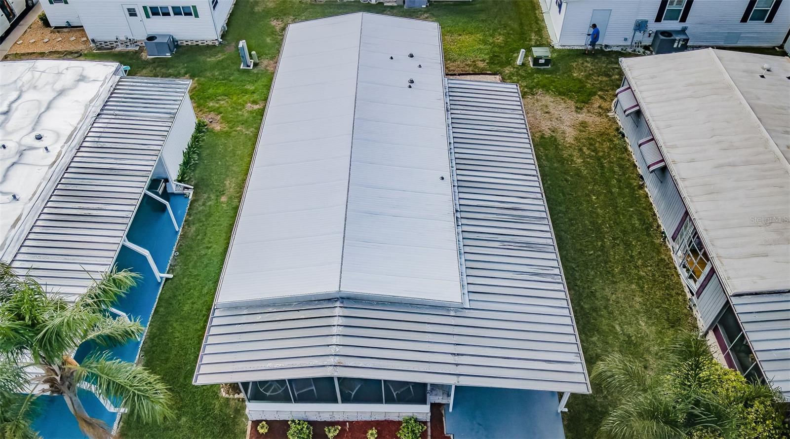 Metal roof and roof over