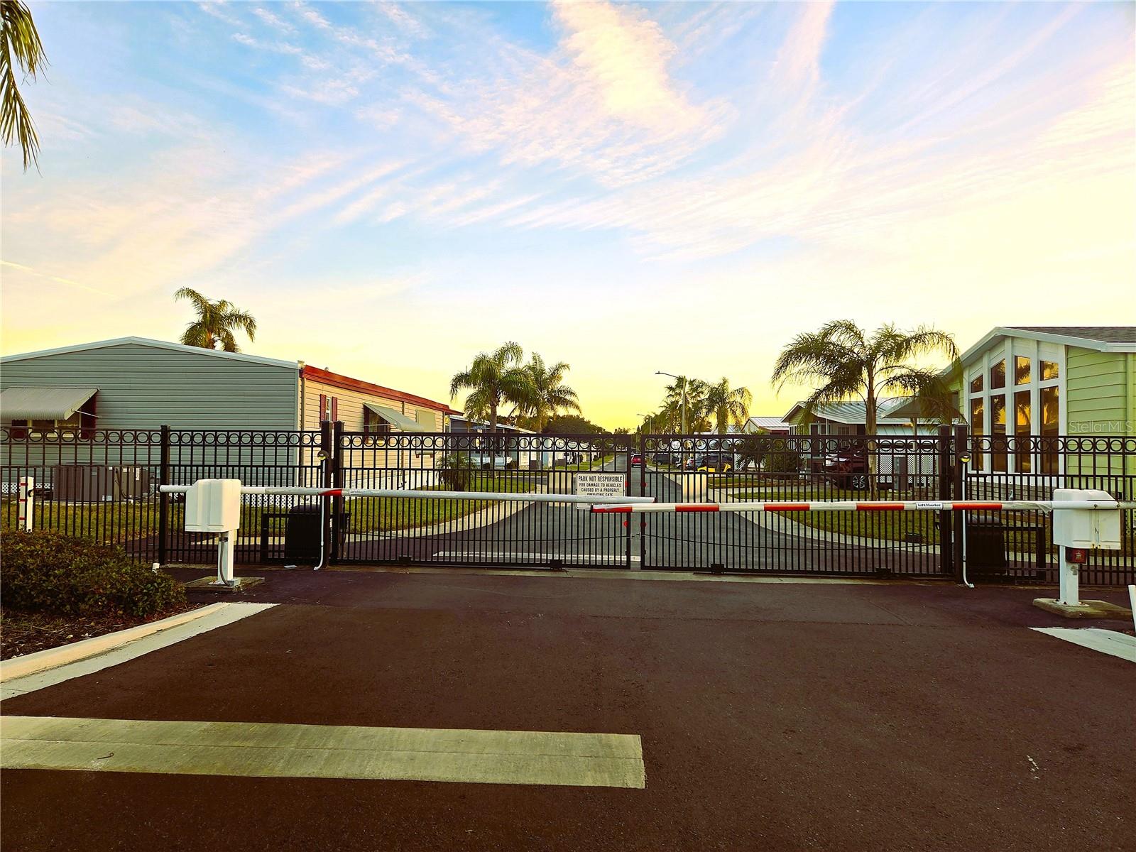 Gated entrance from Mango St.