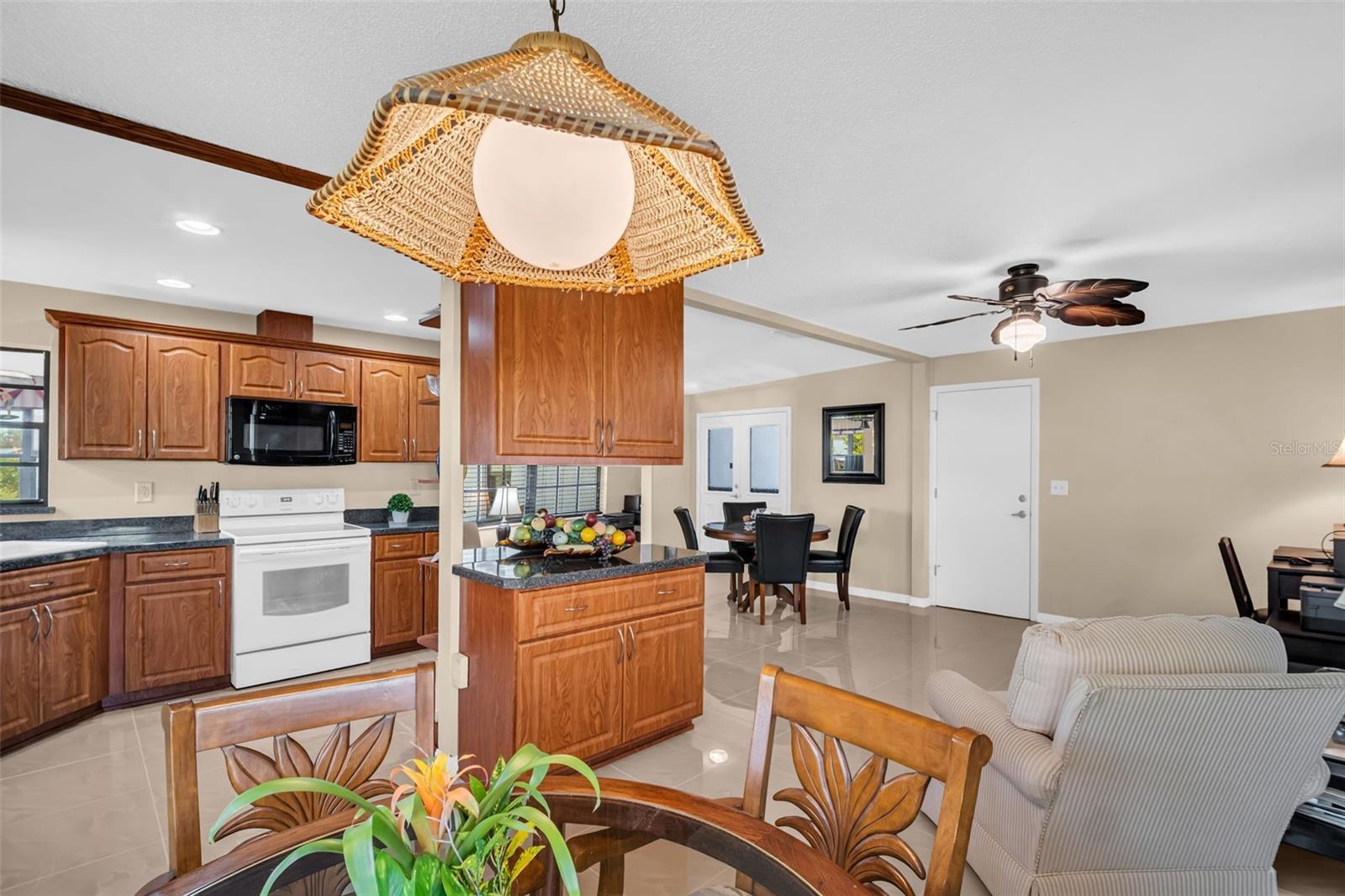 Kitchen opened up and centrally located between main living & dining for easy flow~