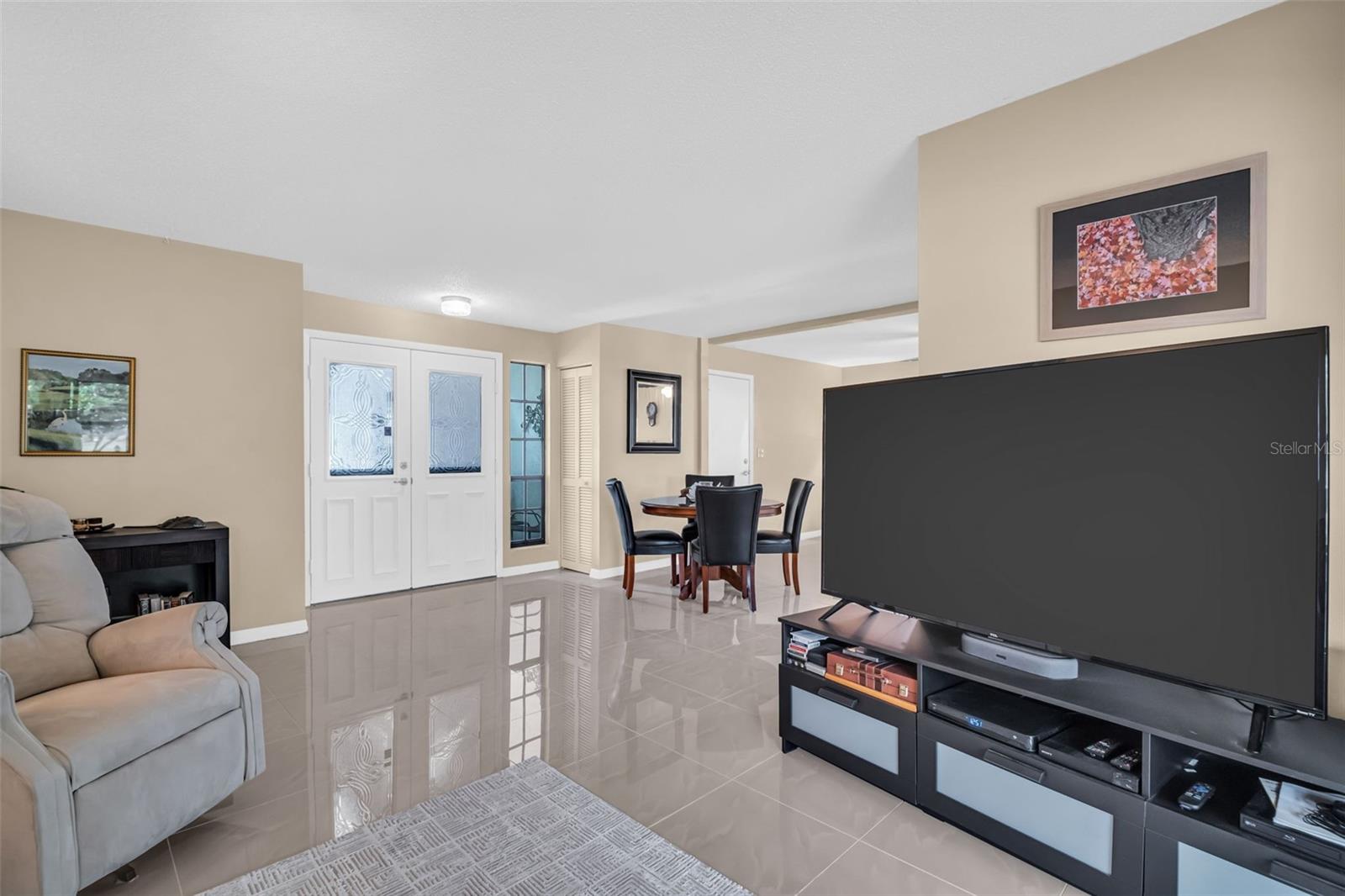 Neutral colors with updated tile floors & baseboards~