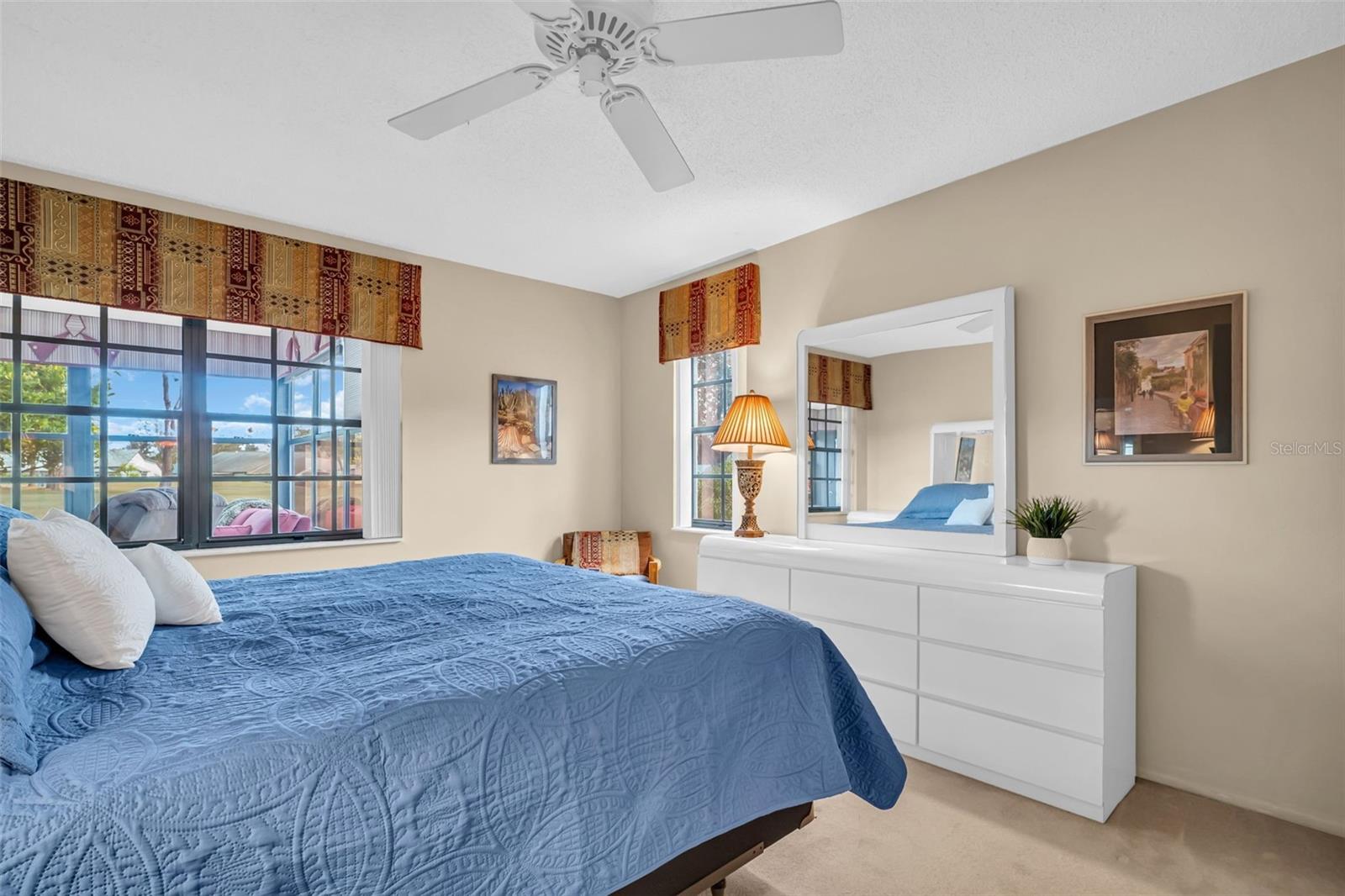 Spacious master suite big enough for a king with graceful golf views~