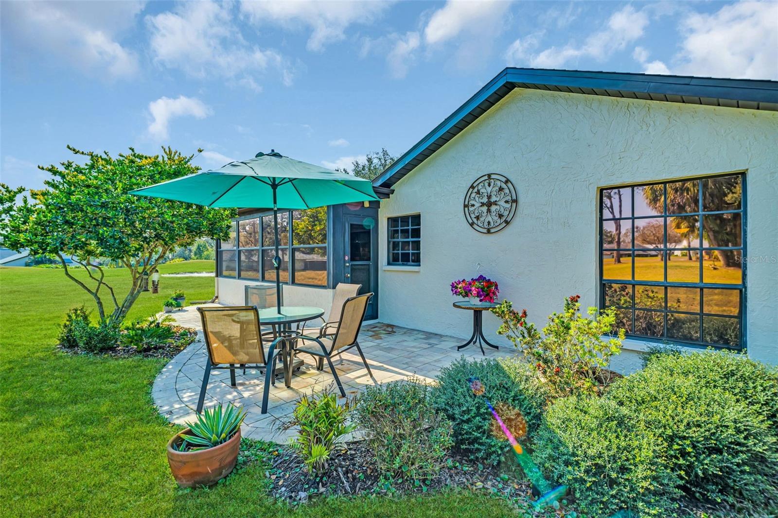 You'll love the new paver patio outside the sunroom~