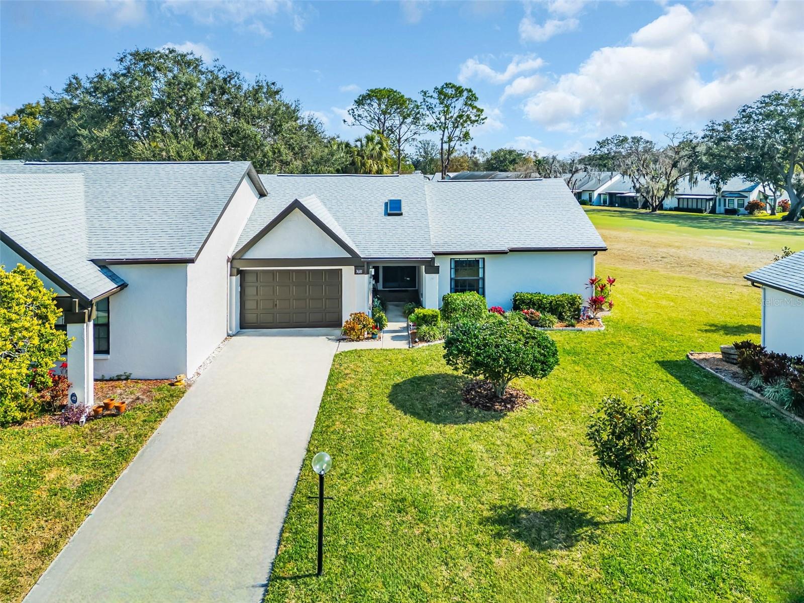 Driveway may be widened if desired. Oversize garage big enough for your car & golf cart too~